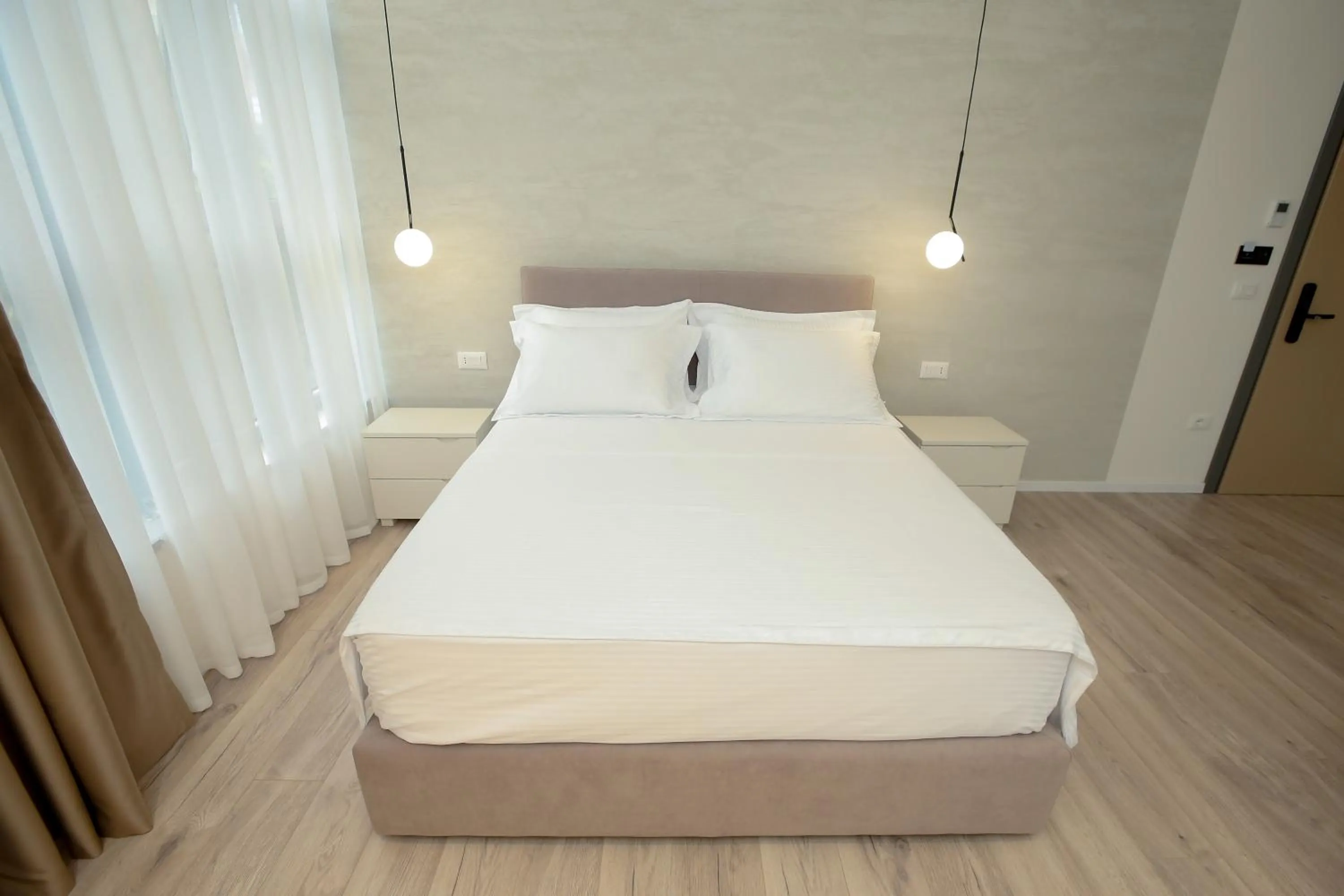 Bed in NÓS Luxury Rooms Shkoder