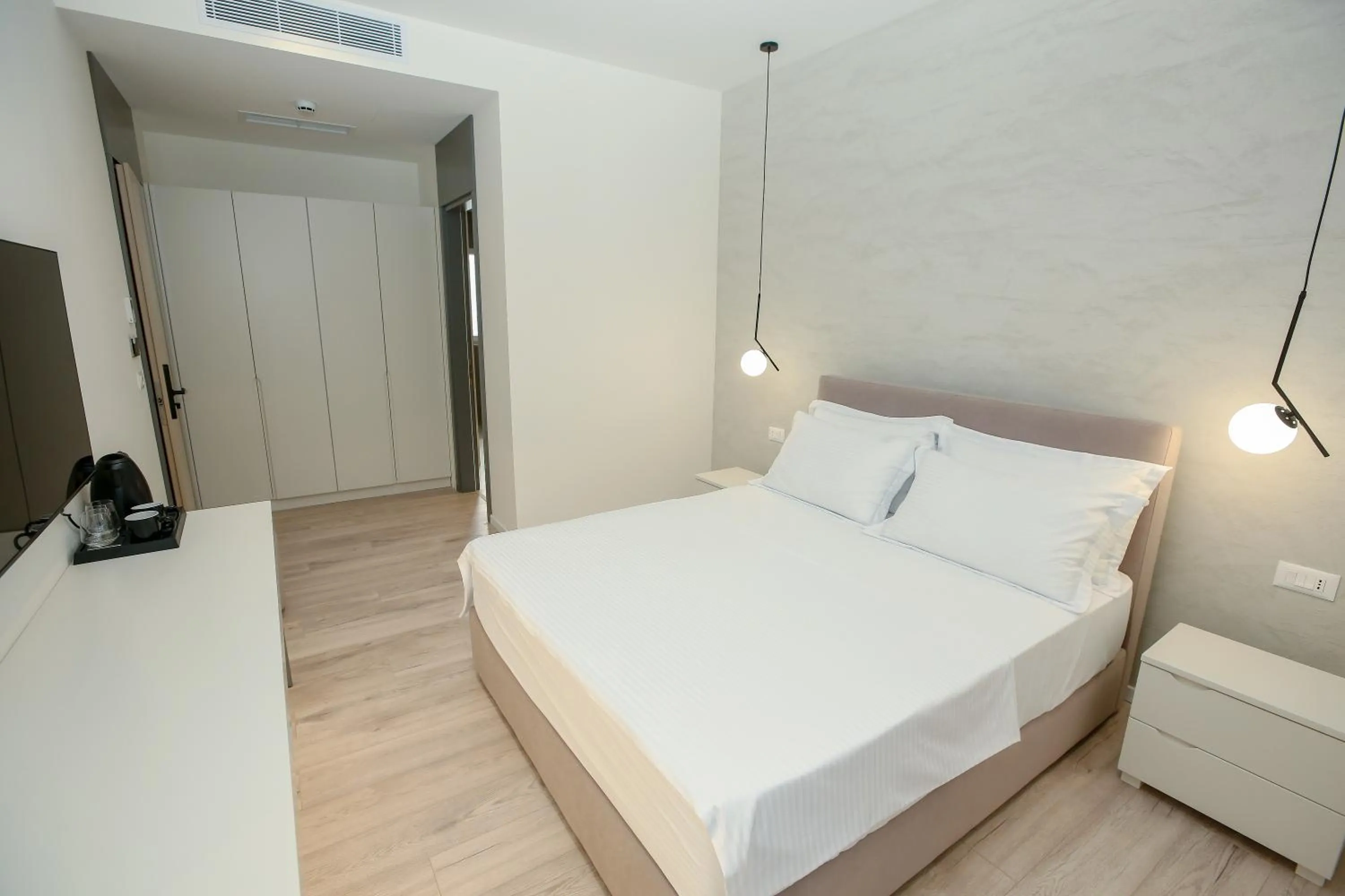 Bed in NÓS Luxury Rooms Shkoder