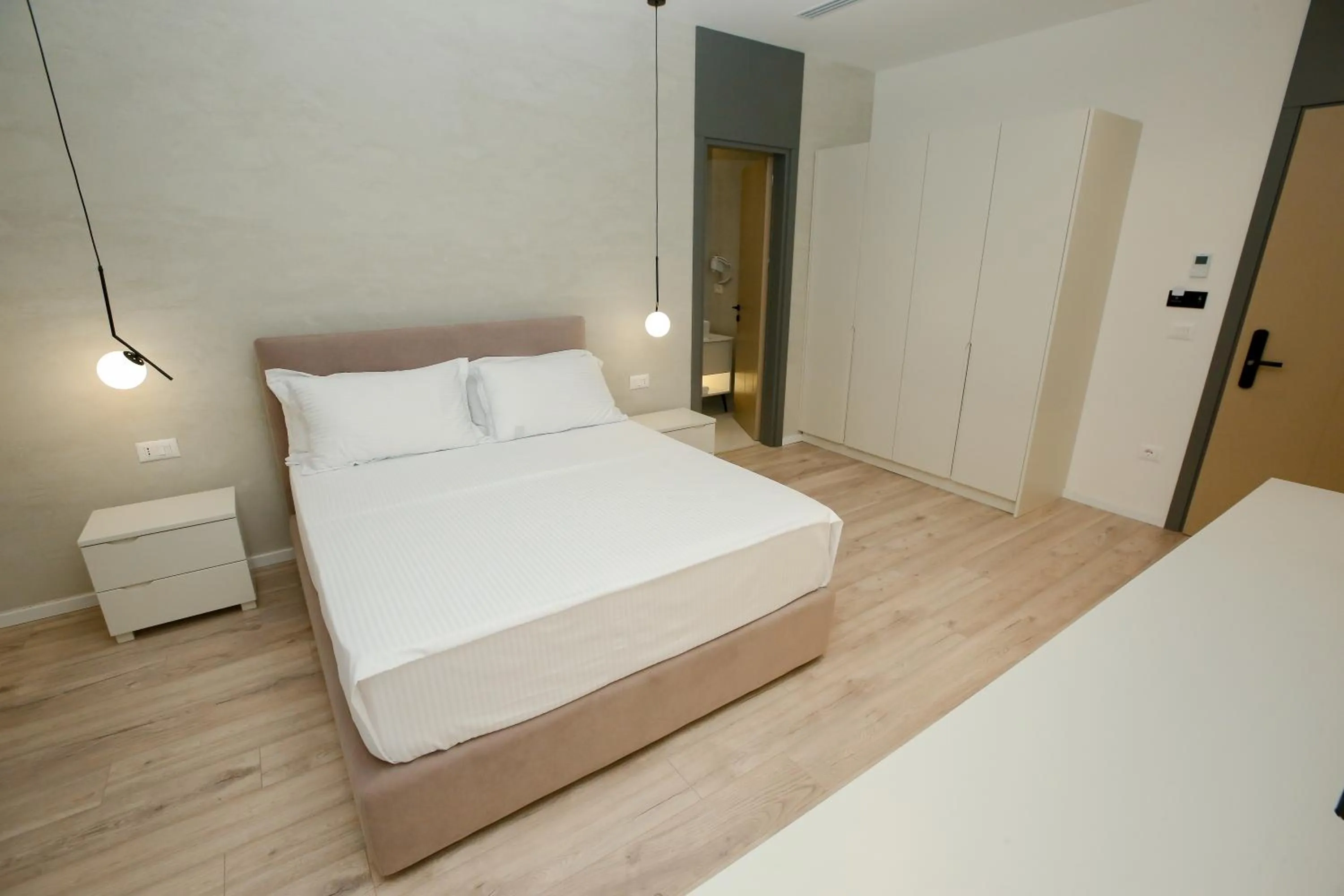 Bed in NÓS Luxury Rooms Shkoder