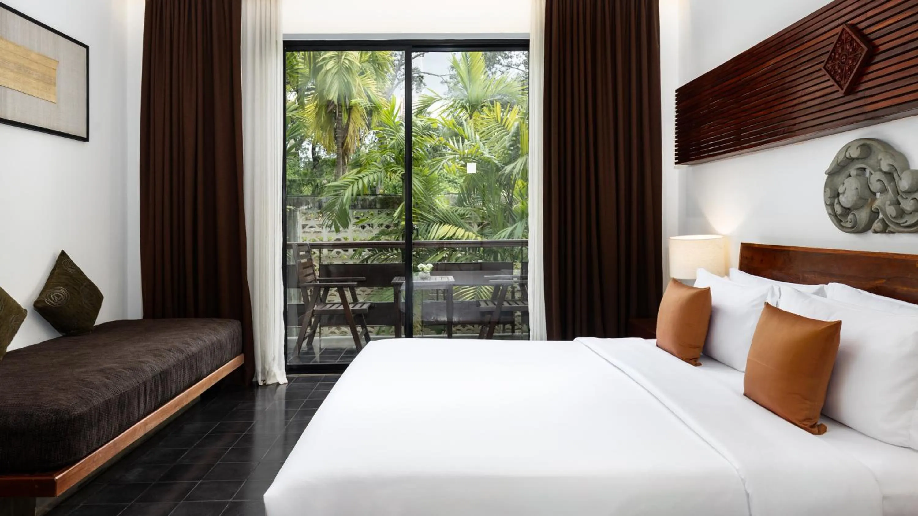 Bed in Lynnaya Urban River Resort