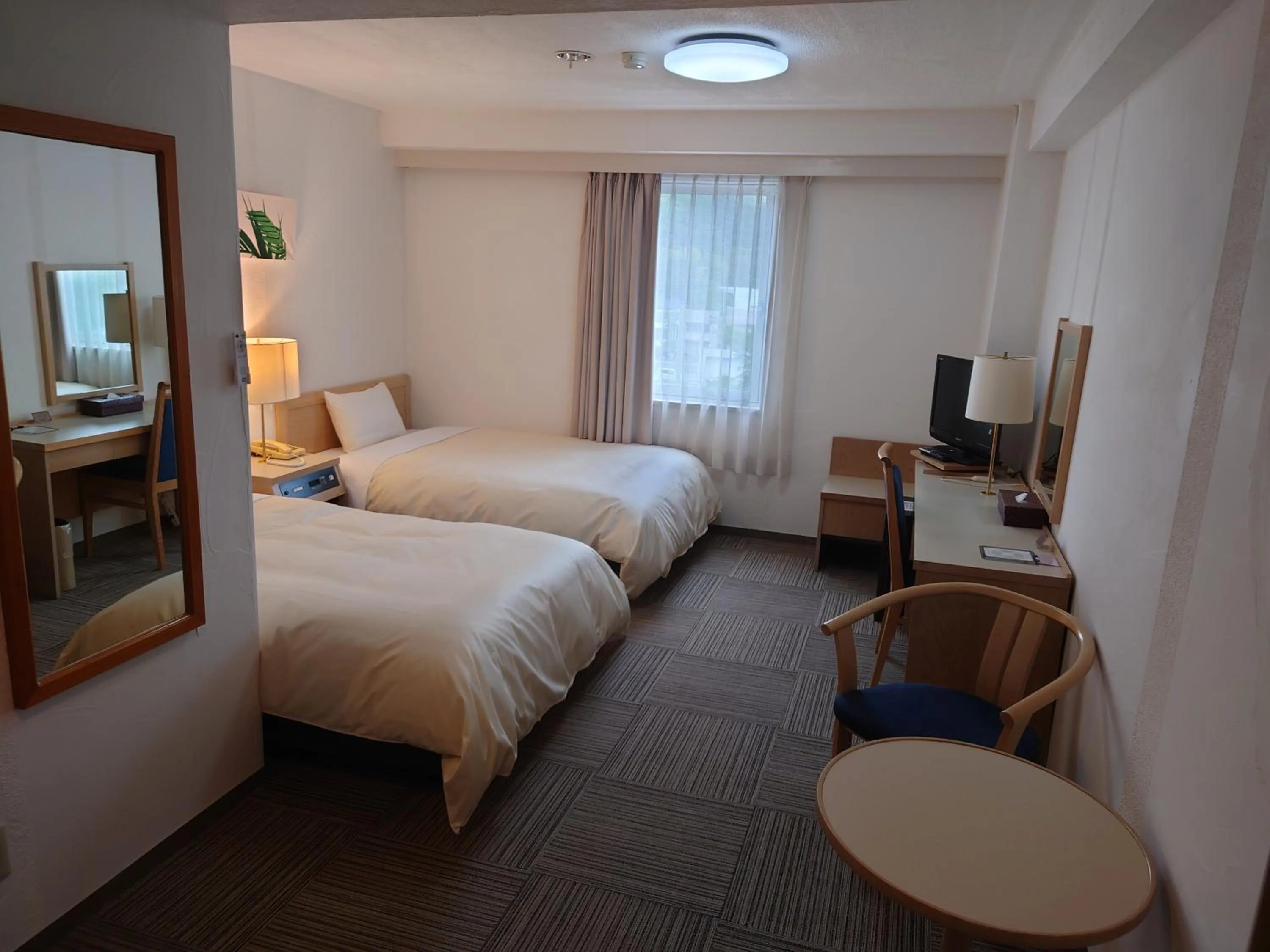 Photo of the whole room, Bed in Iwaki Prince Hotel