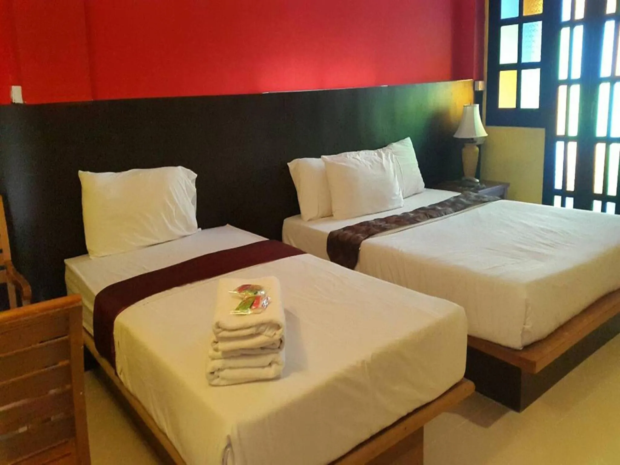 Bed in Bangkok Travel Suites Hotel