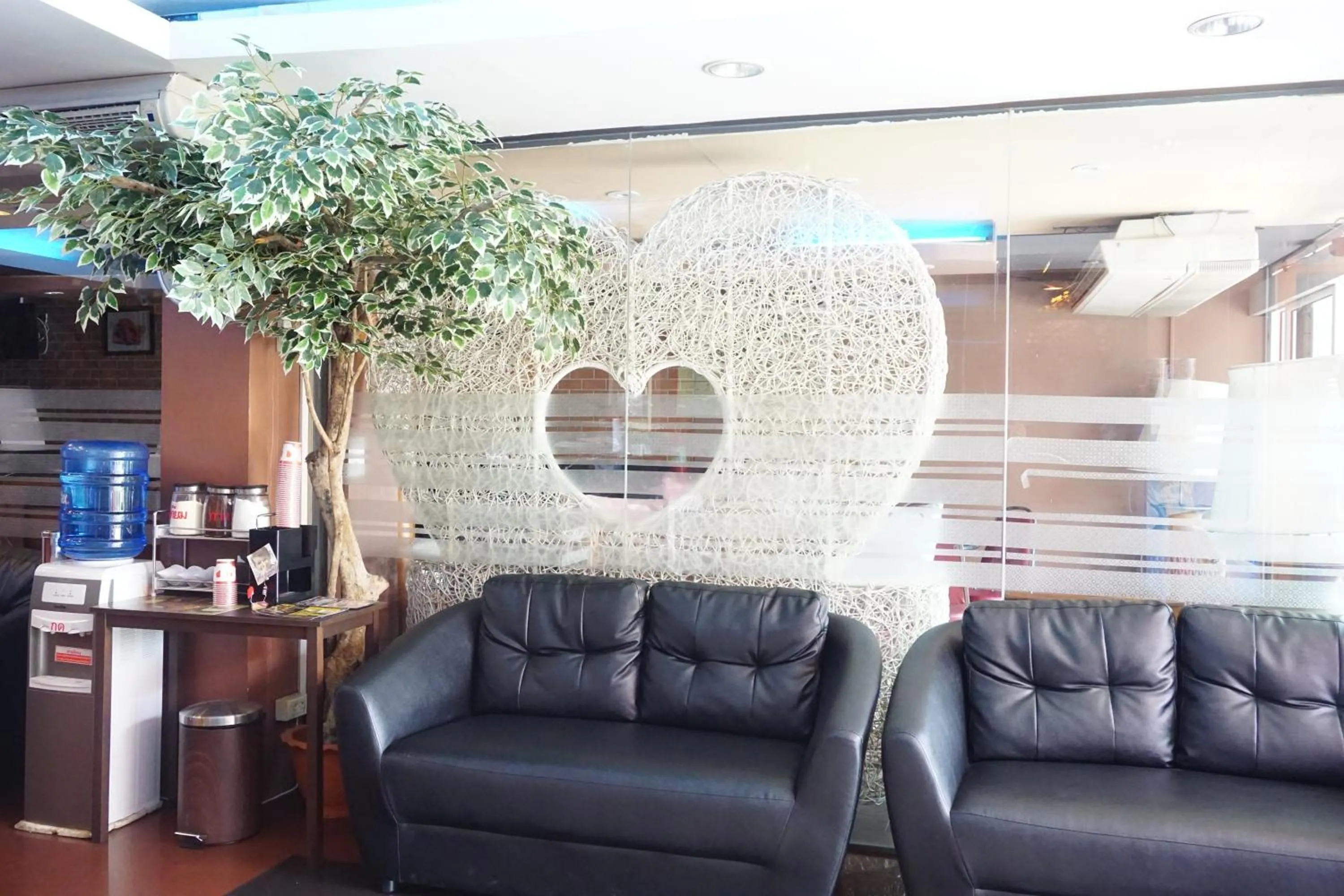 Seating area in Bangkok Travel Suites Hotel