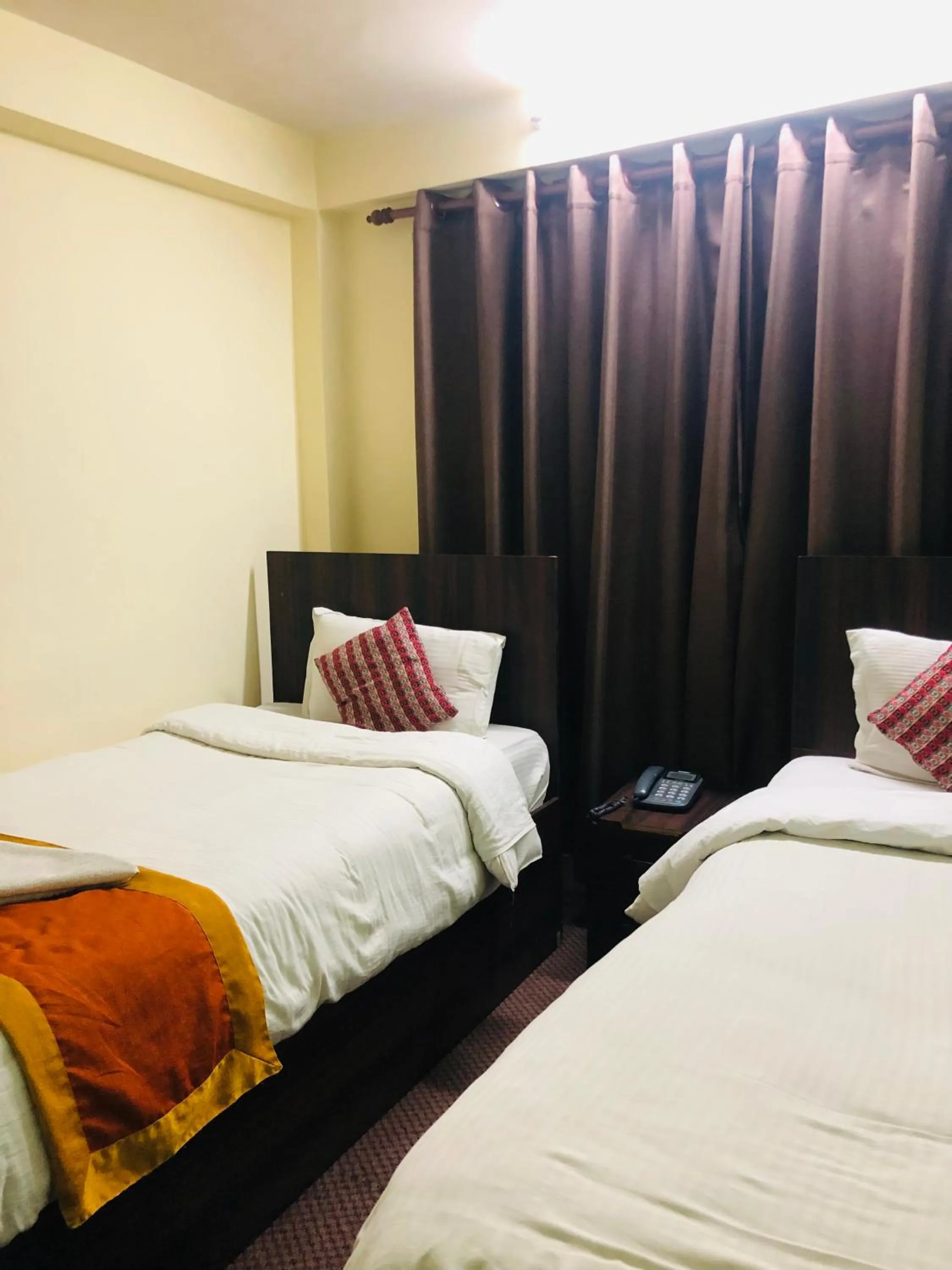 Bed in Yeti Cozy Hotel