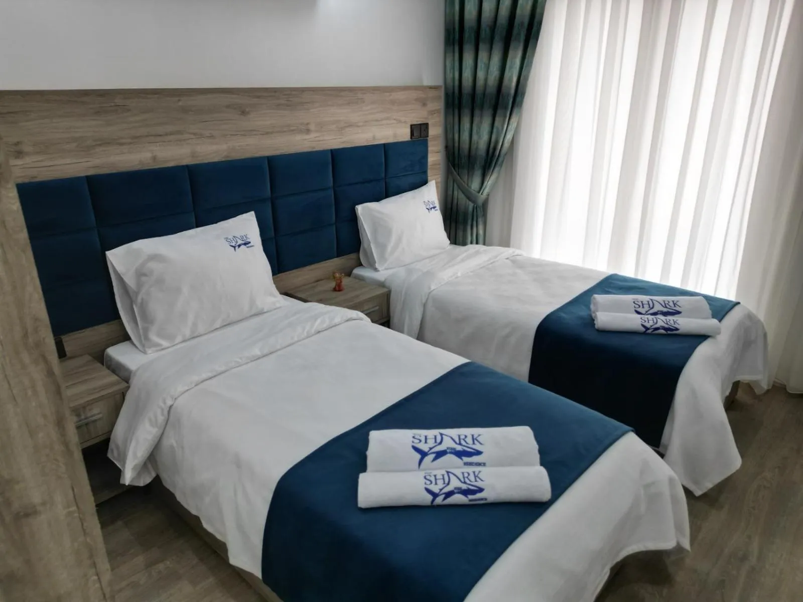 Bed in Nurel Shark Residence