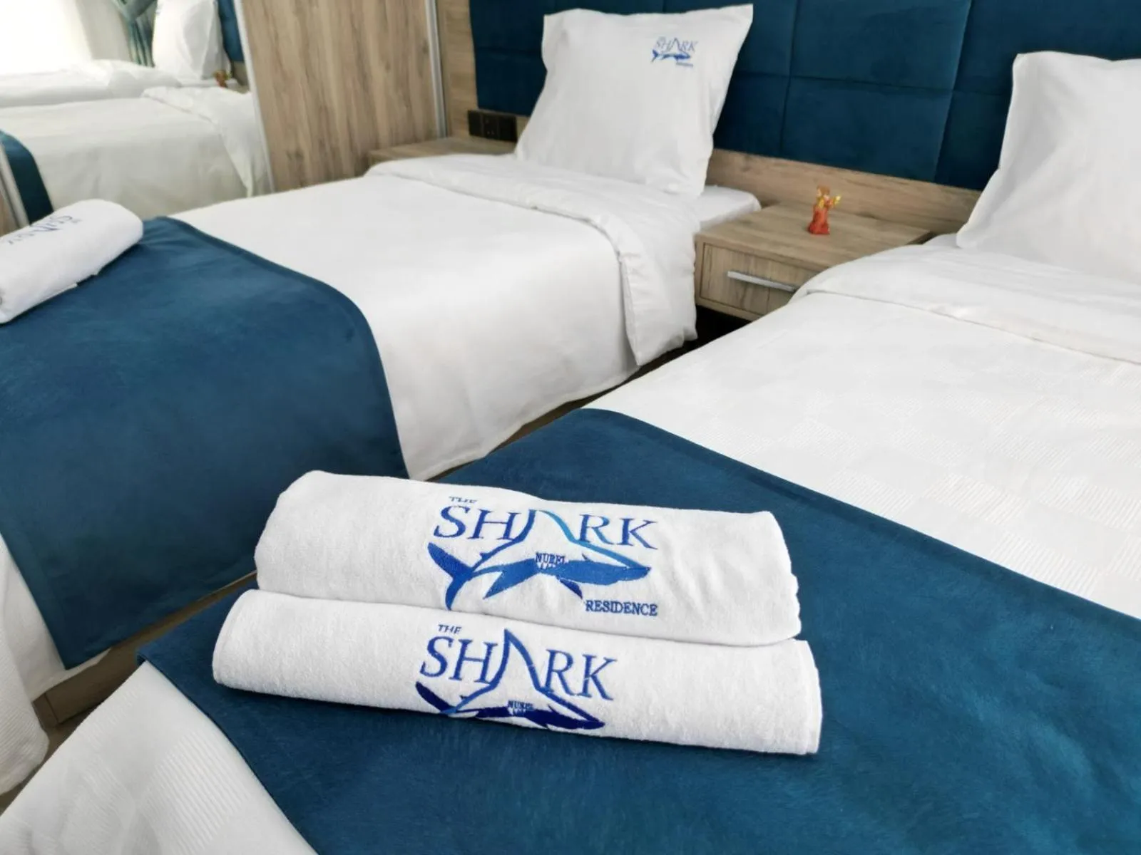 Bed in Nurel Shark Residence