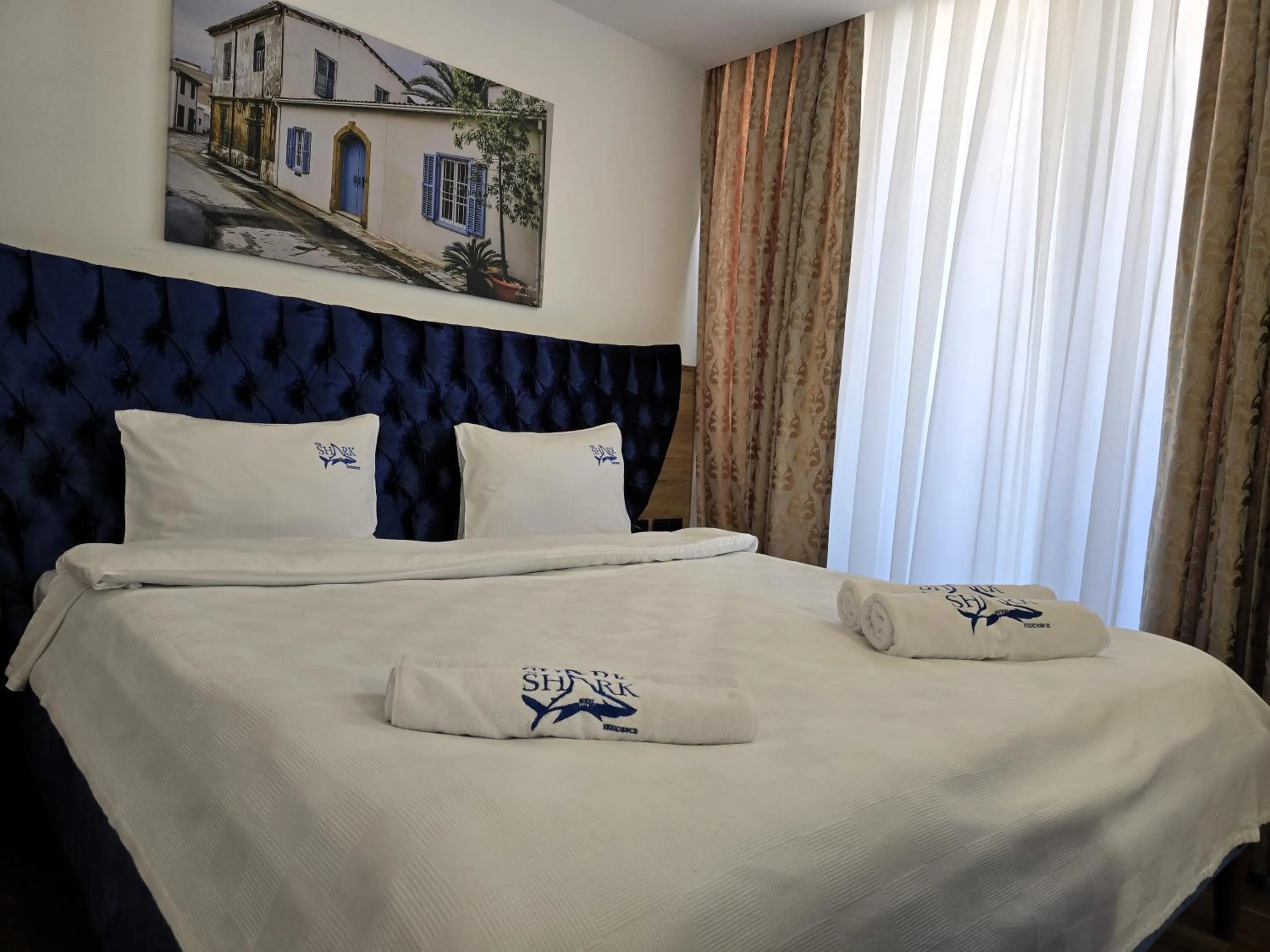 Bed in Nurel Shark Residence