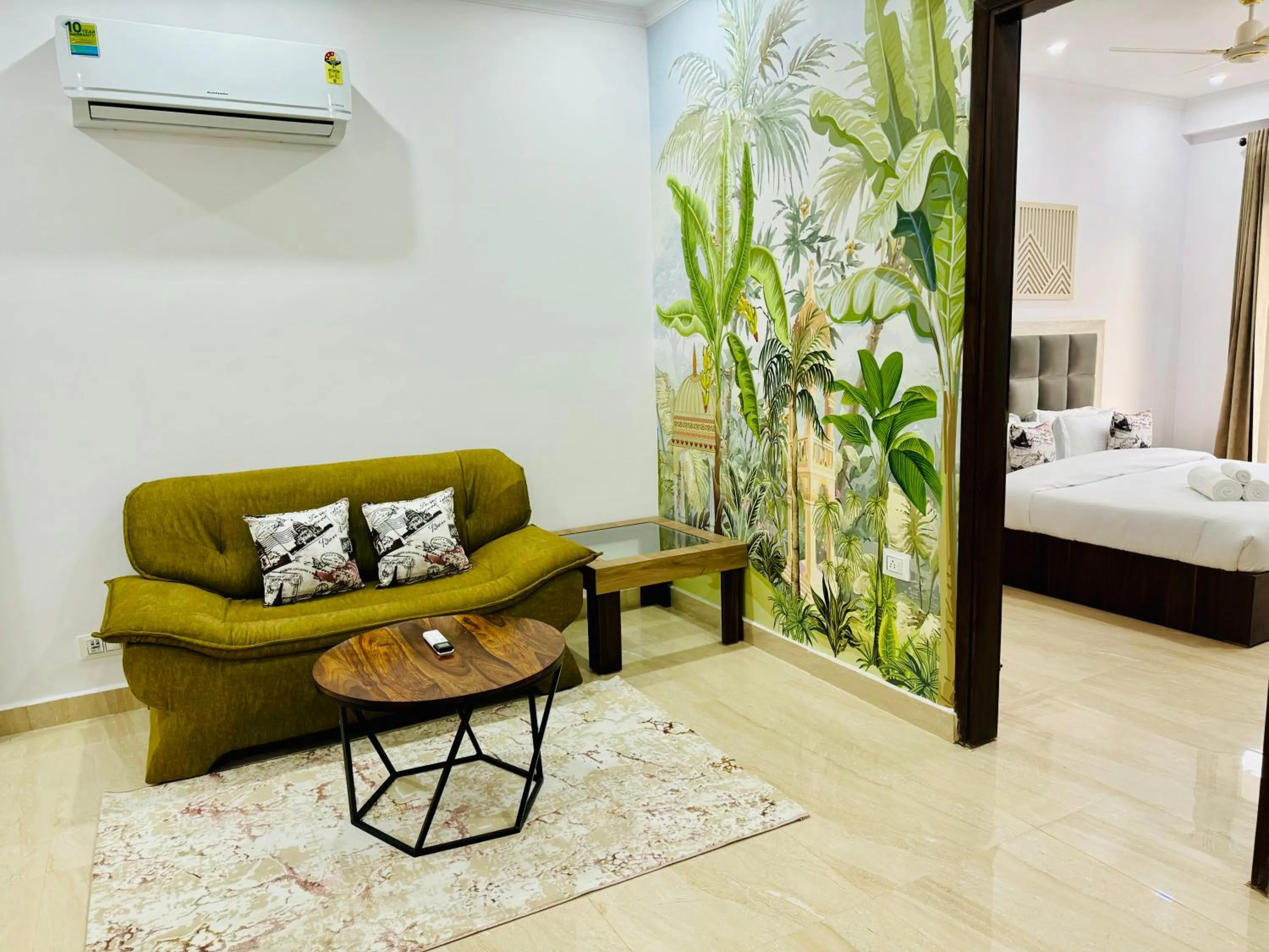 Living room, Bed in ZEN Suites - Golf Course Road Gurgaon