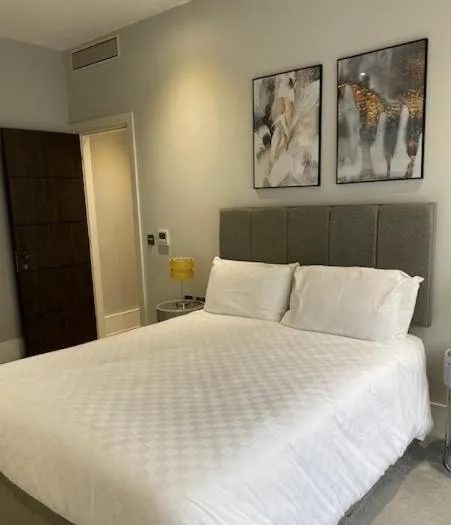 Bed in Green Street Residences by Aeria Apartments