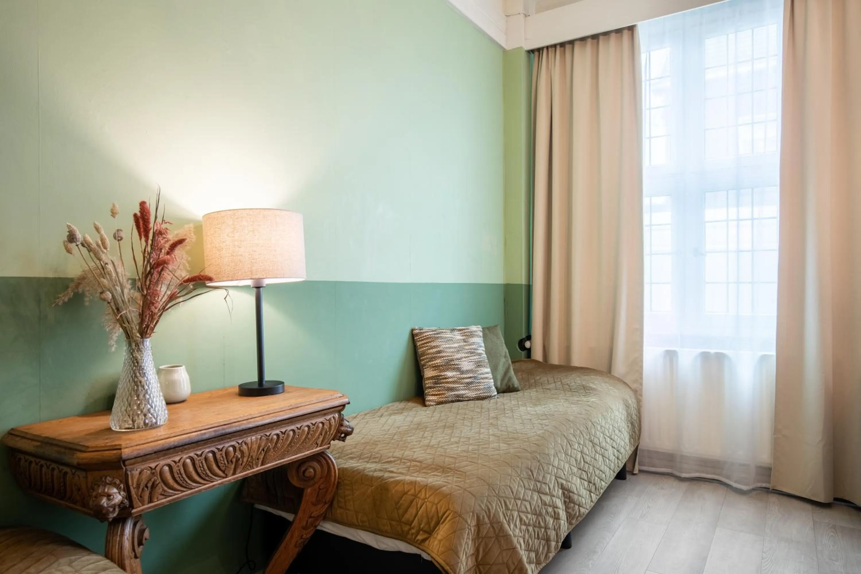 Bed in Hotel Nieuw Antiek