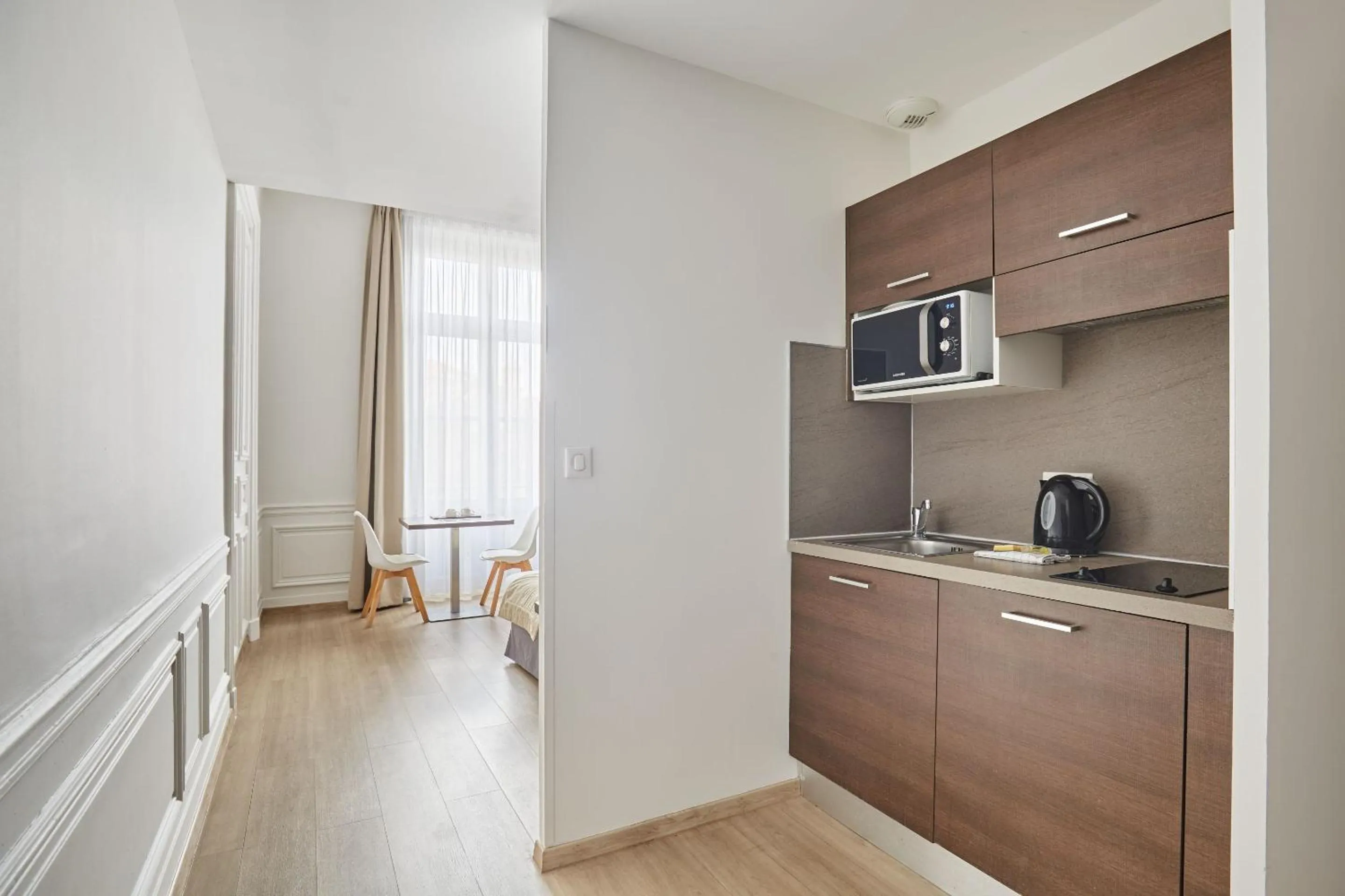 Kitchen or kitchenette in Appart Hotel Odalys City Montpellier Les Occitanes