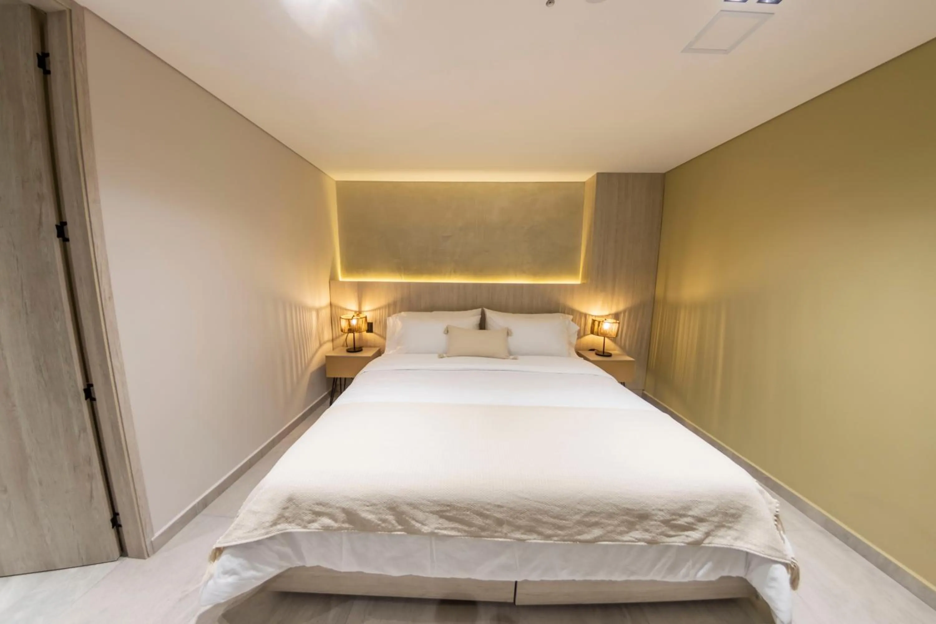 Bed in Sonata 44 Hotel Laureles