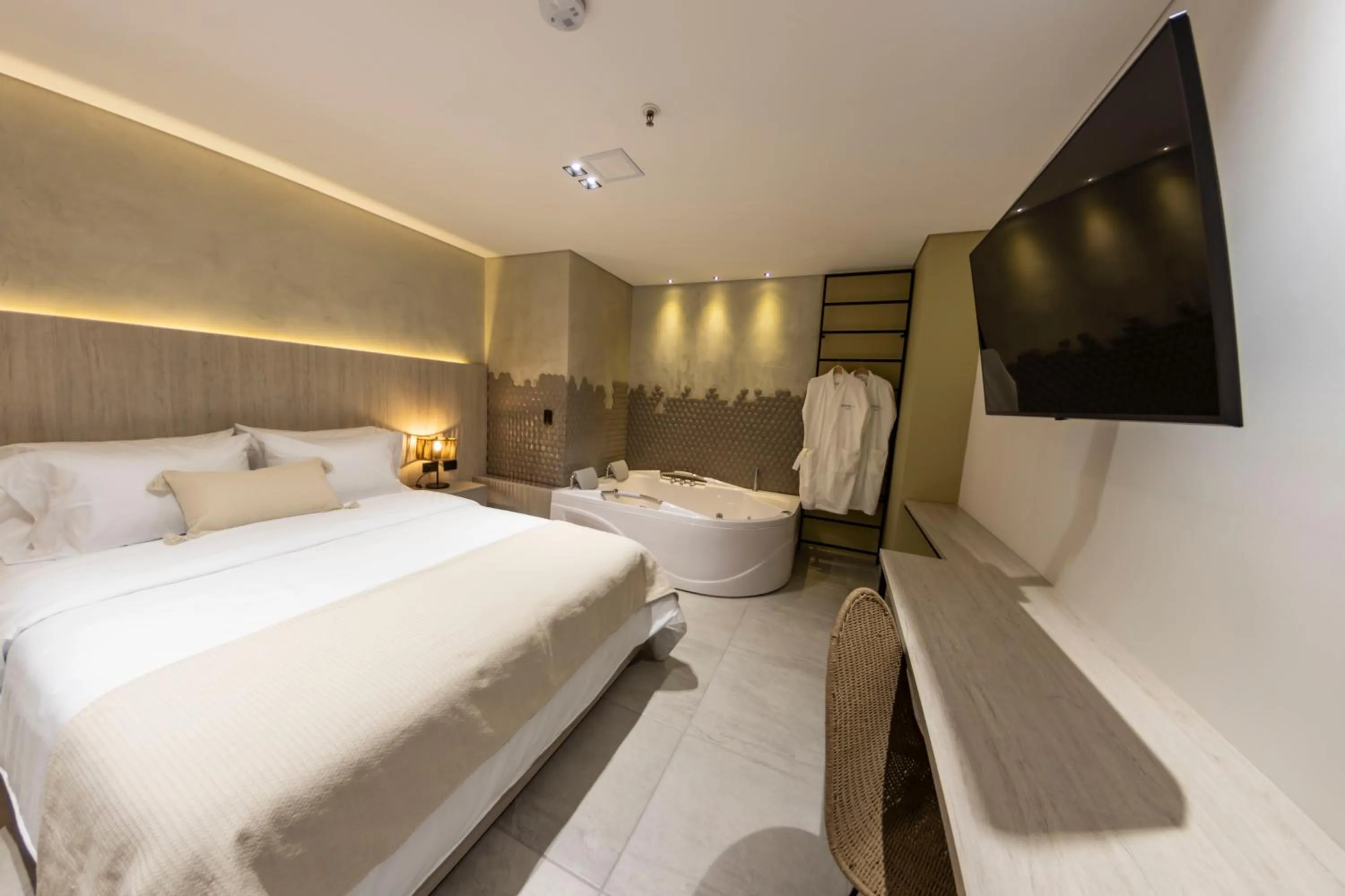 Bed in Sonata 44 Hotel Laureles