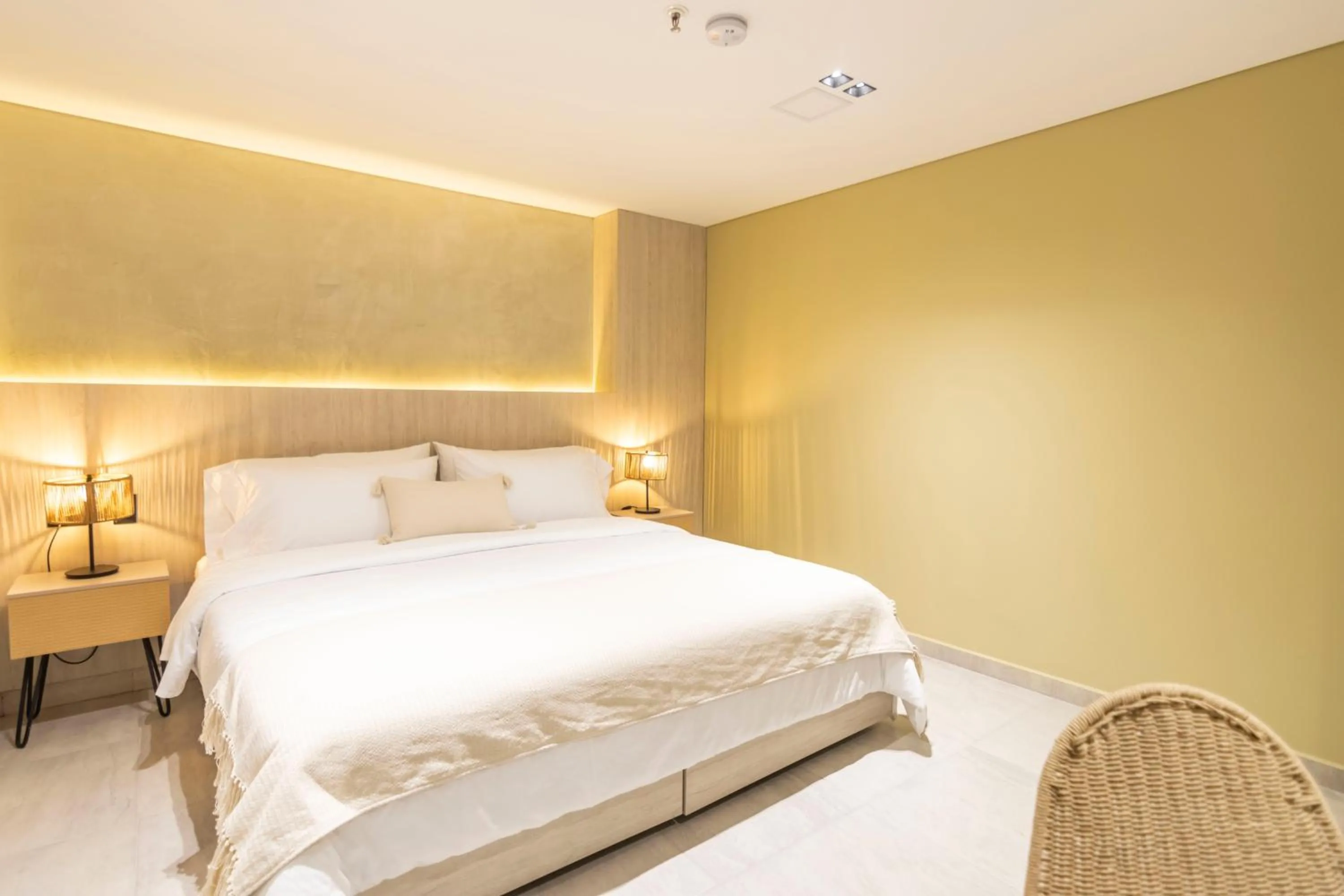 Bed in Sonata 44 Hotel Laureles