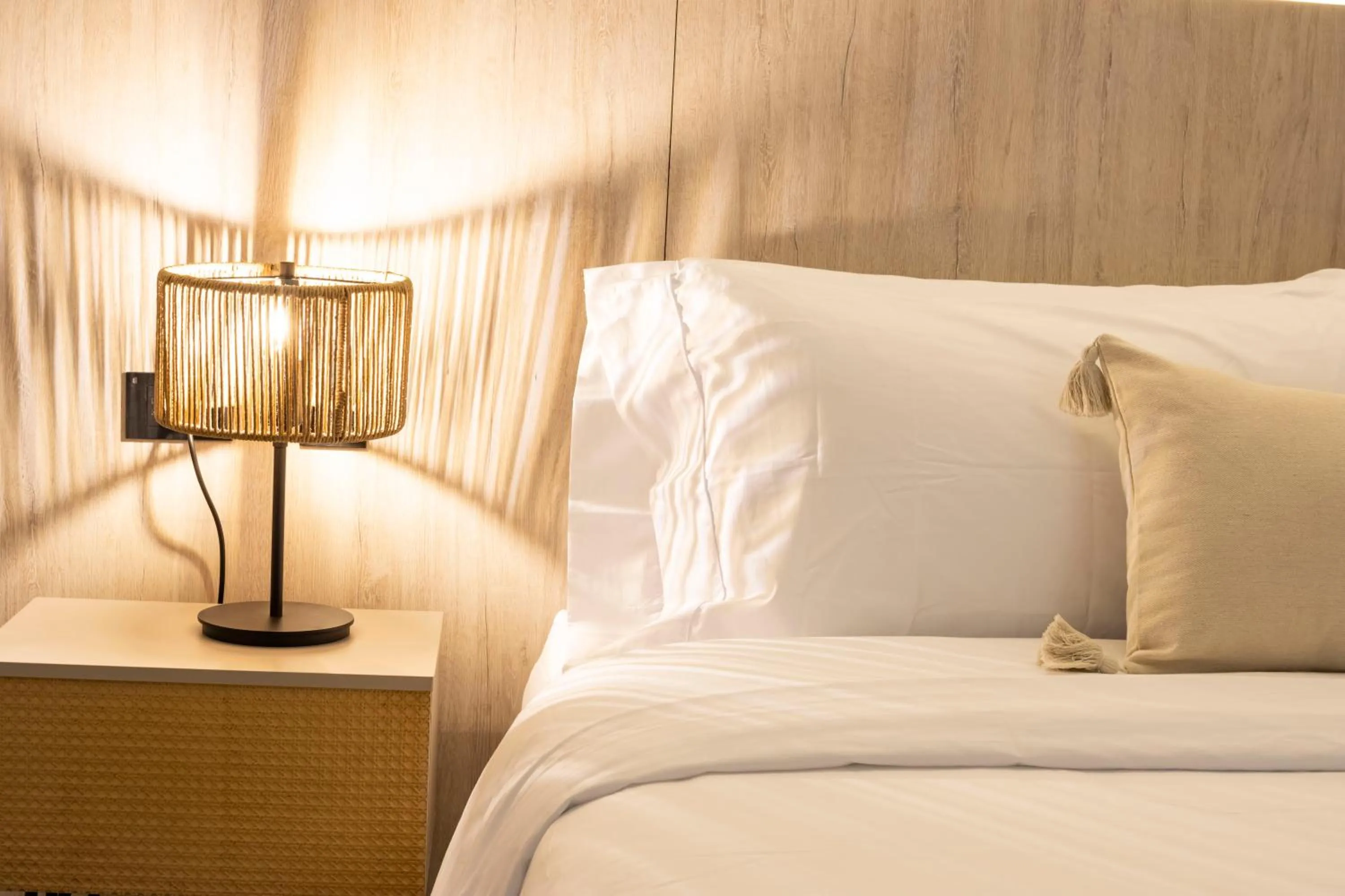 Bed in Sonata 44 Hotel Laureles