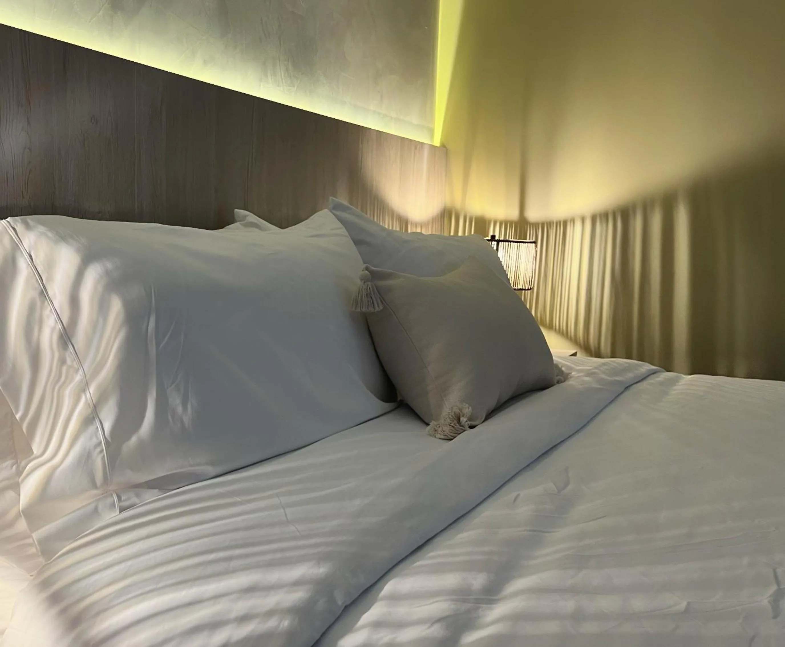Bed in Sonata 44 Hotel Laureles