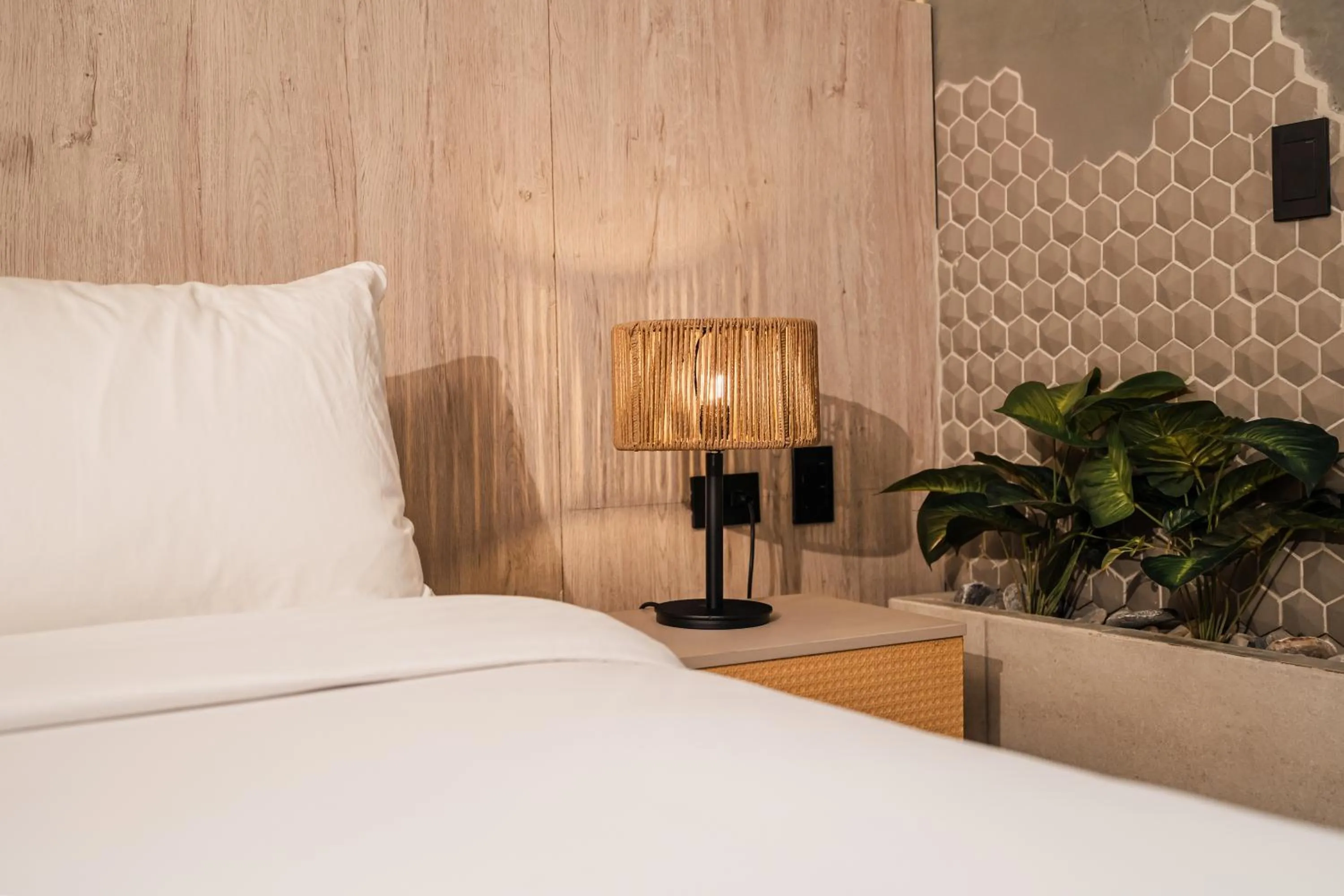 Bed in Sonata 44 Hotel Laureles