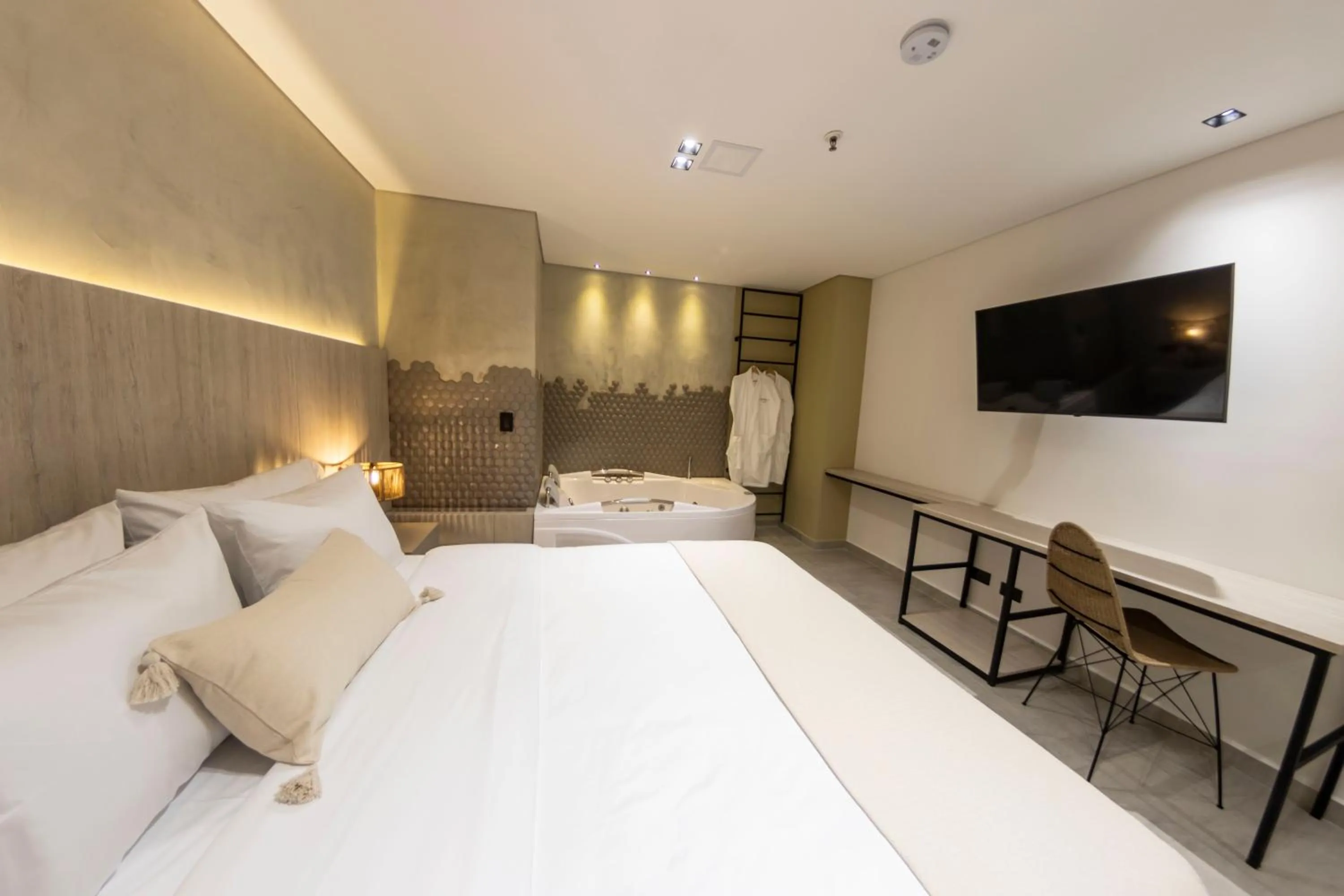 Bed in Sonata 44 Hotel Laureles