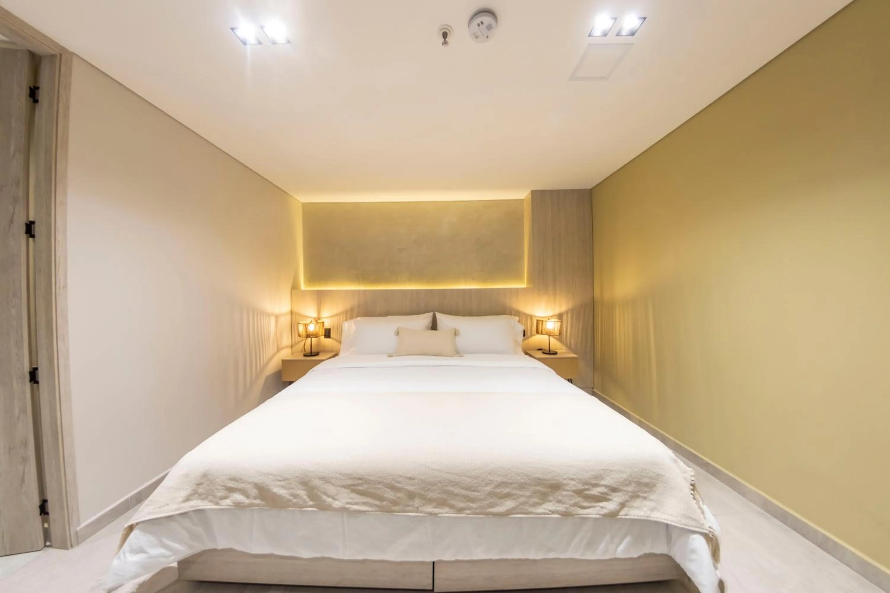 Bed in Sonata 44 Hotel Laureles