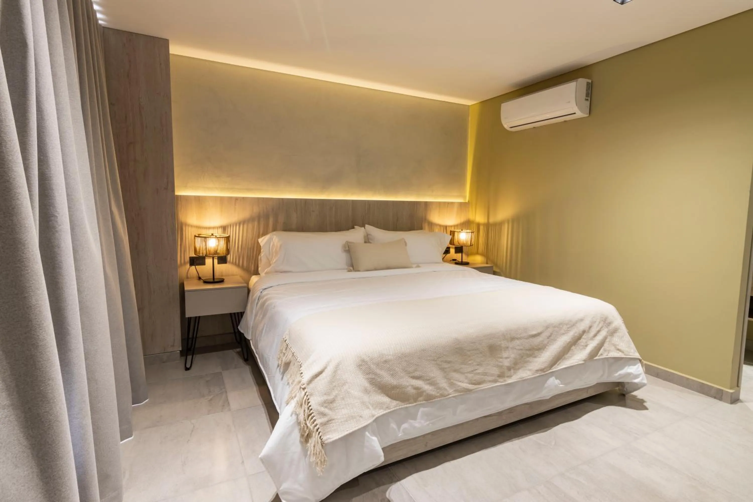 Bed in Sonata 44 Hotel Laureles