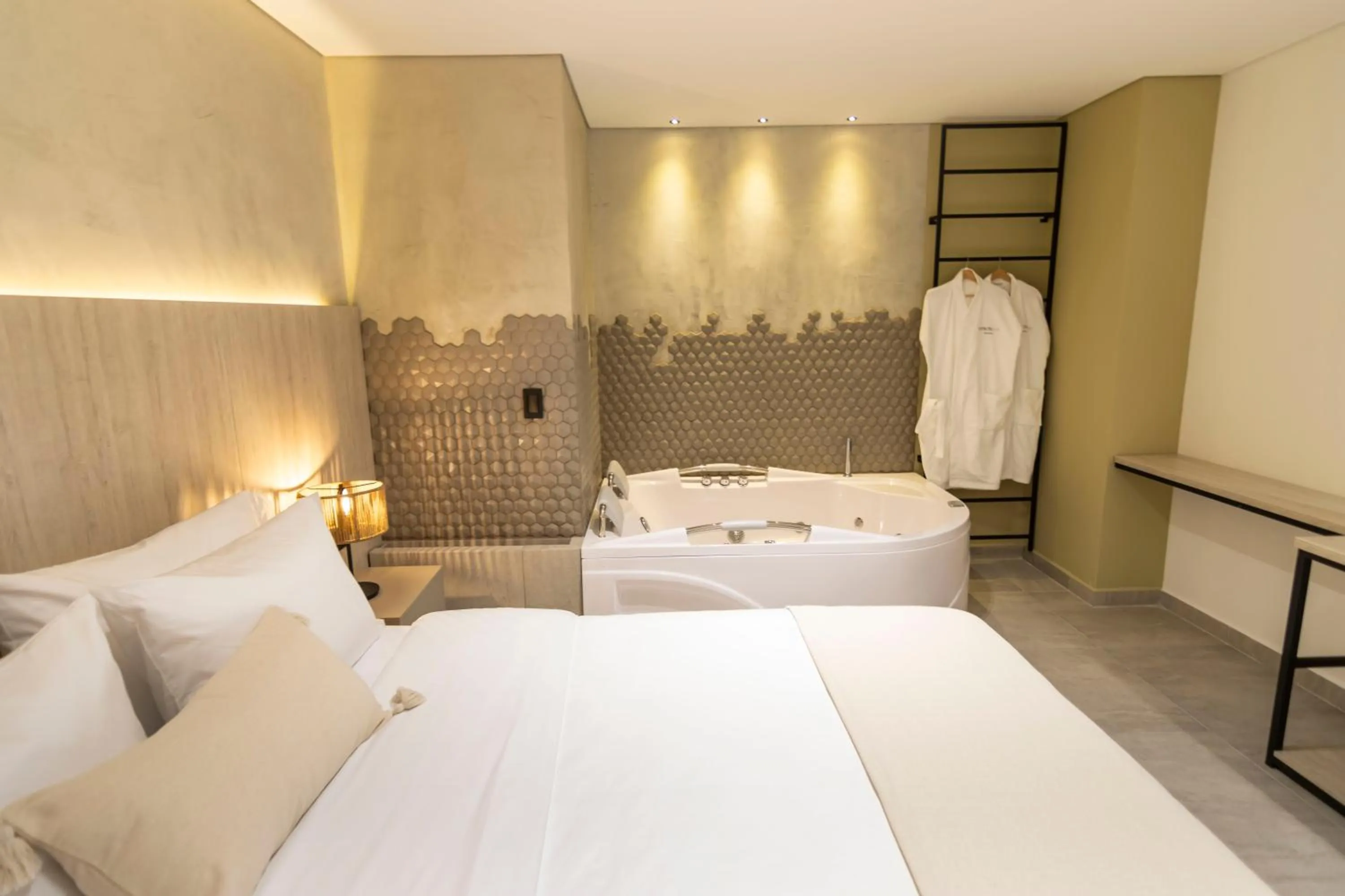 Bed in Sonata 44 Hotel Laureles