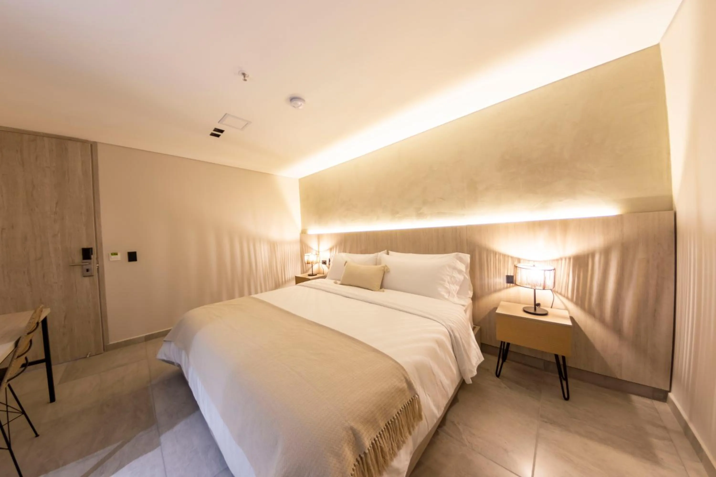 Bed in Sonata 44 Hotel Laureles