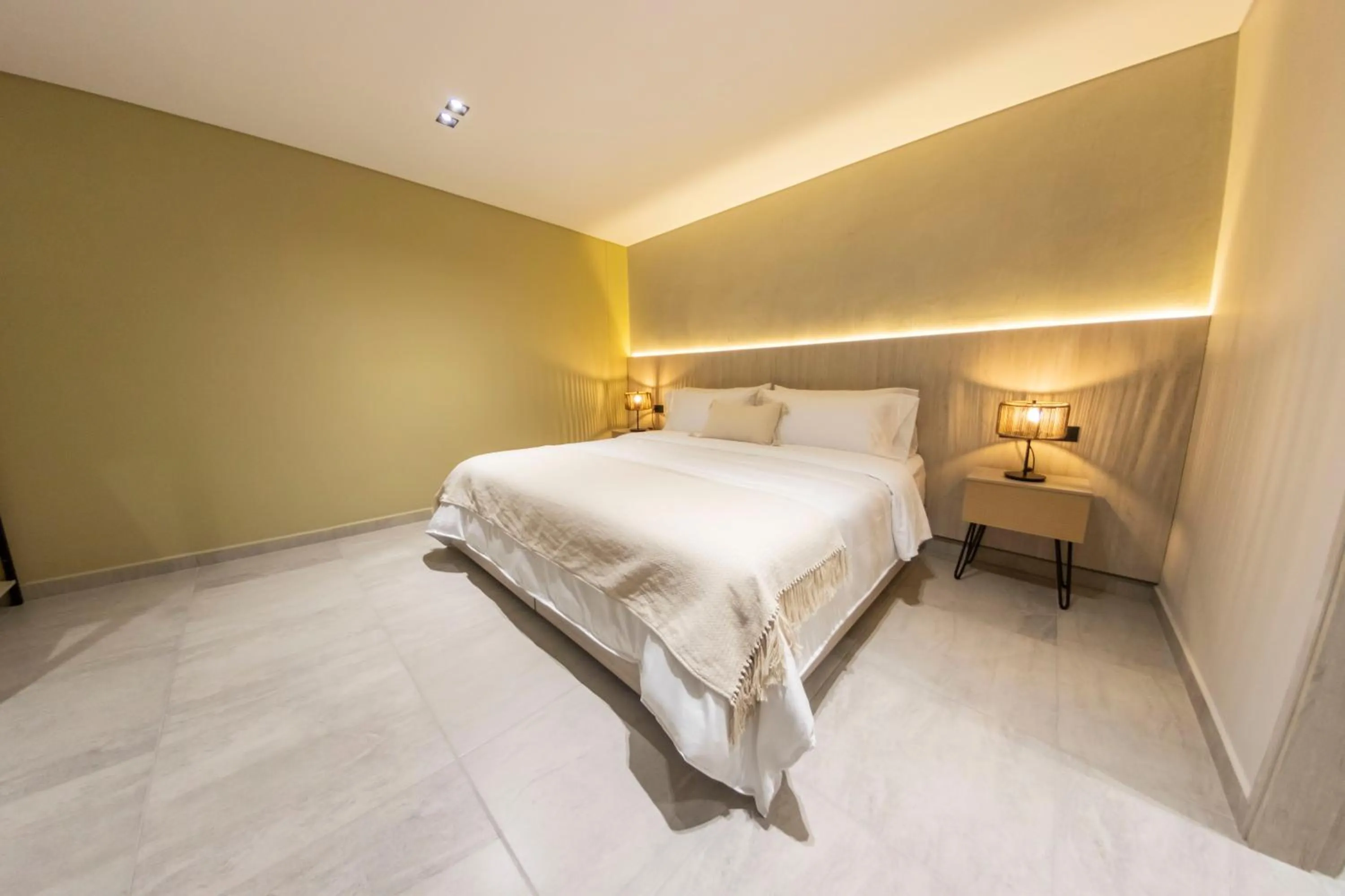 Bed in Sonata 44 Hotel Laureles