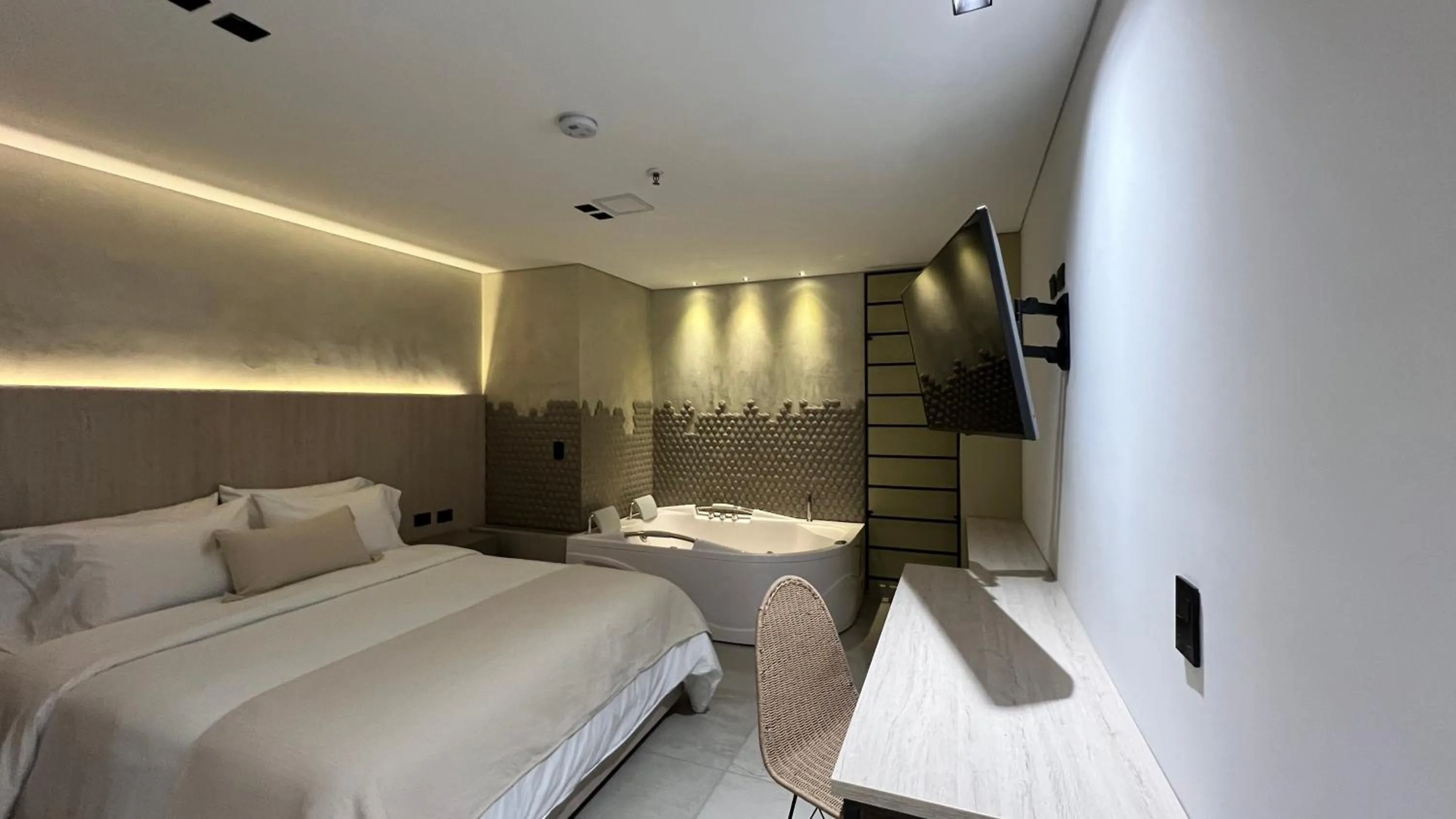 Bed in Sonata 44 Hotel Laureles