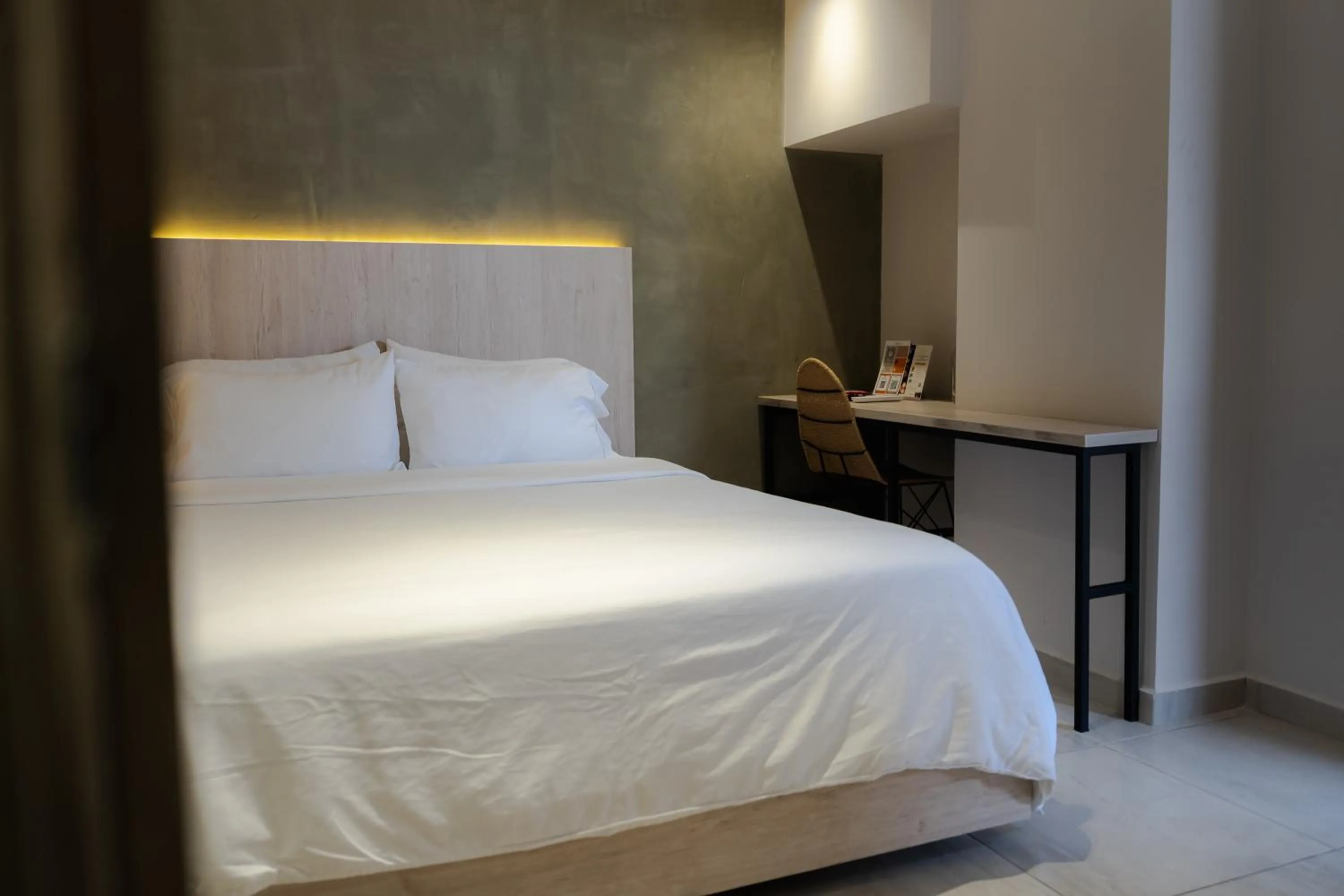 Bed in Sonata 44 Hotel Laureles