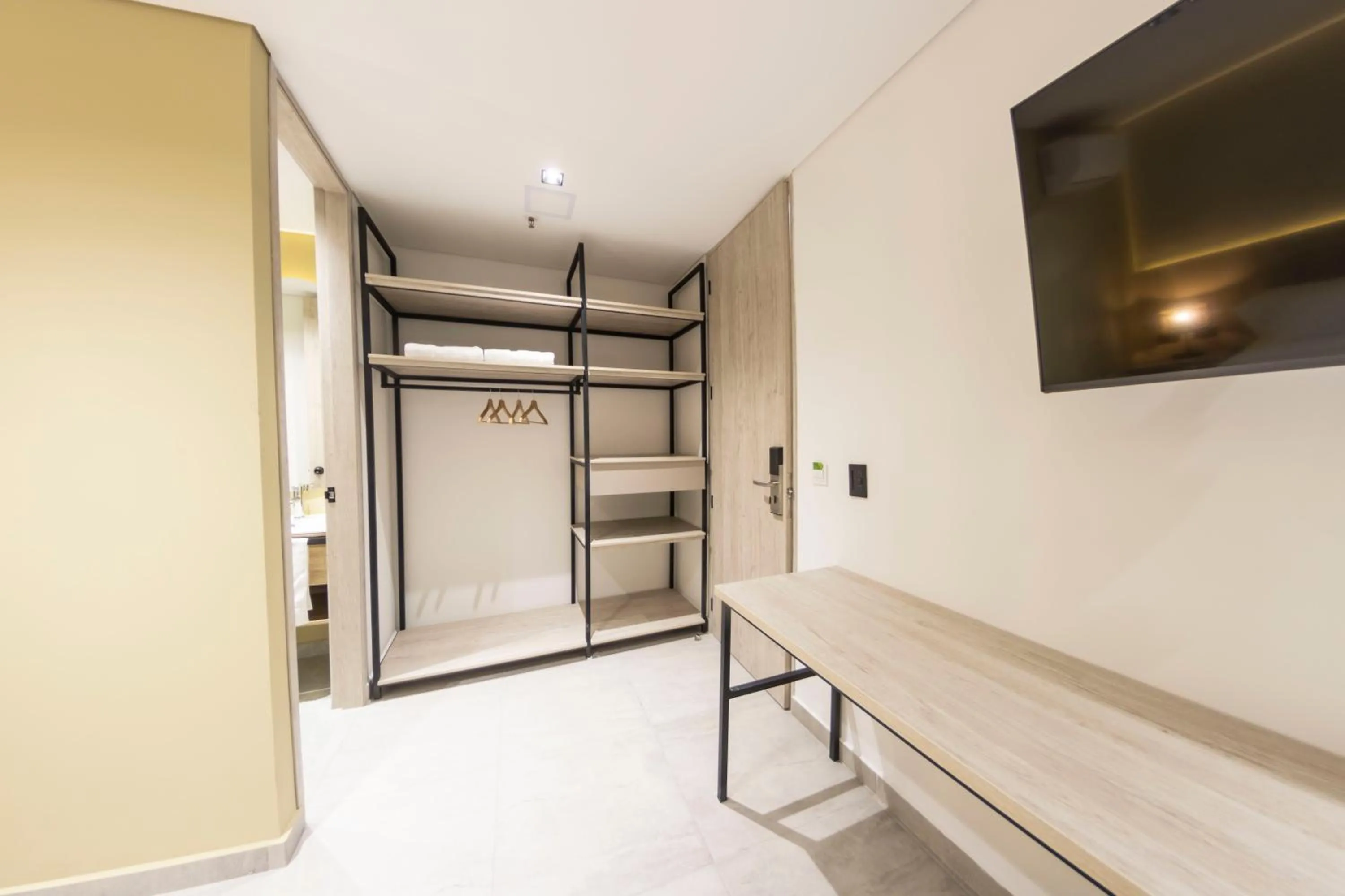 Bed in Sonata 44 Hotel Laureles