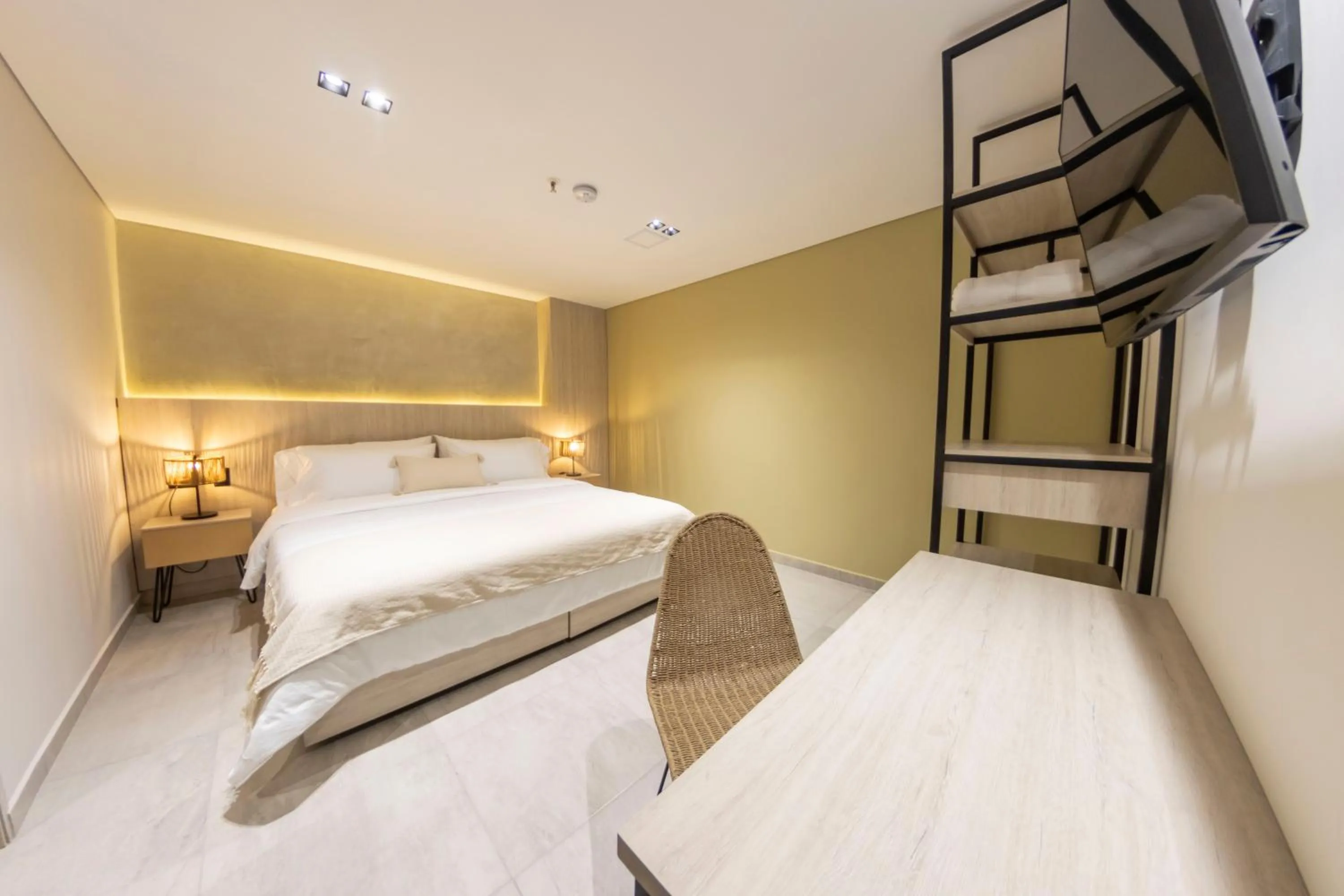 Bed in Sonata 44 Hotel Laureles