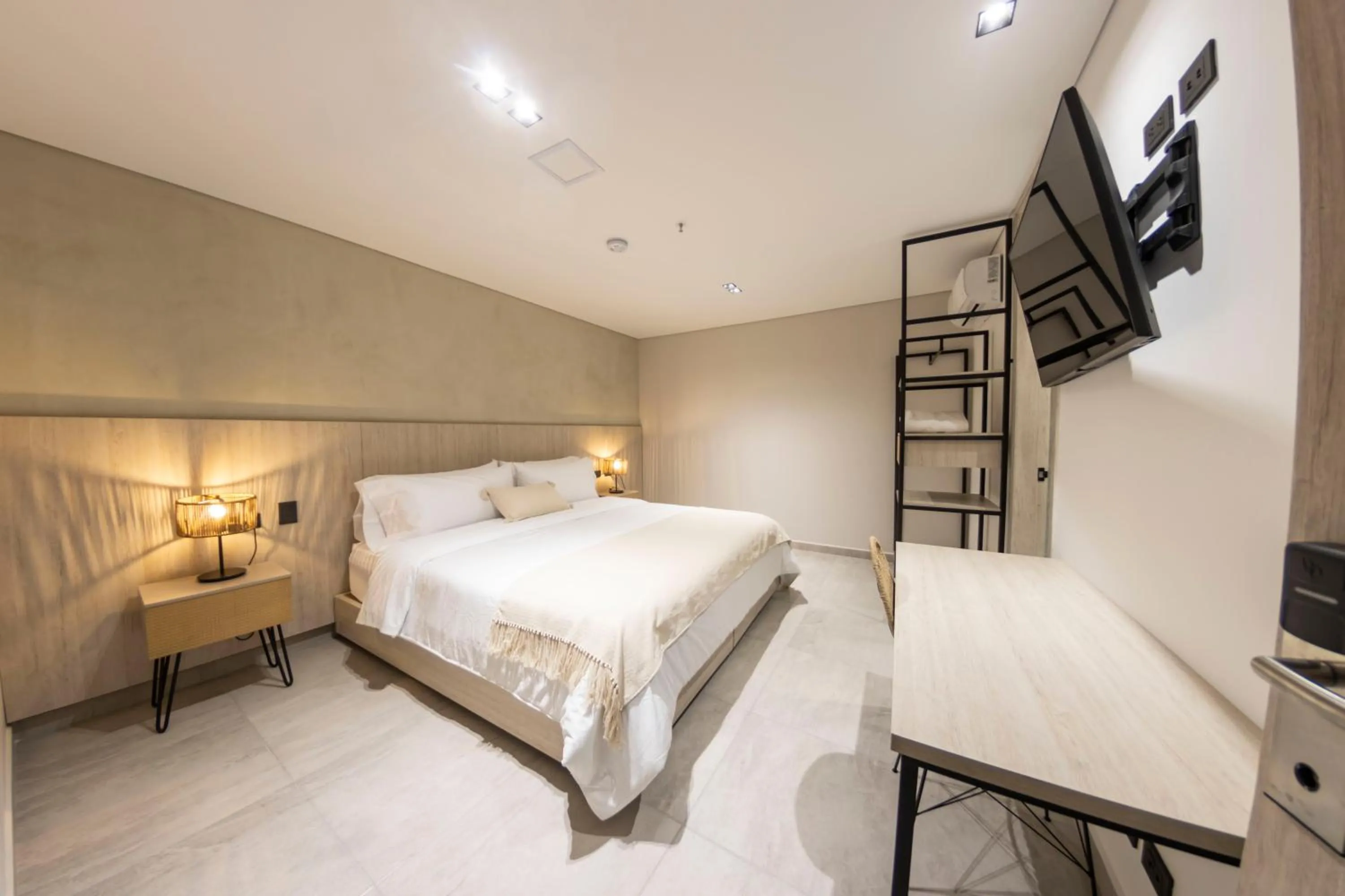 Bed in Sonata 44 Hotel Laureles