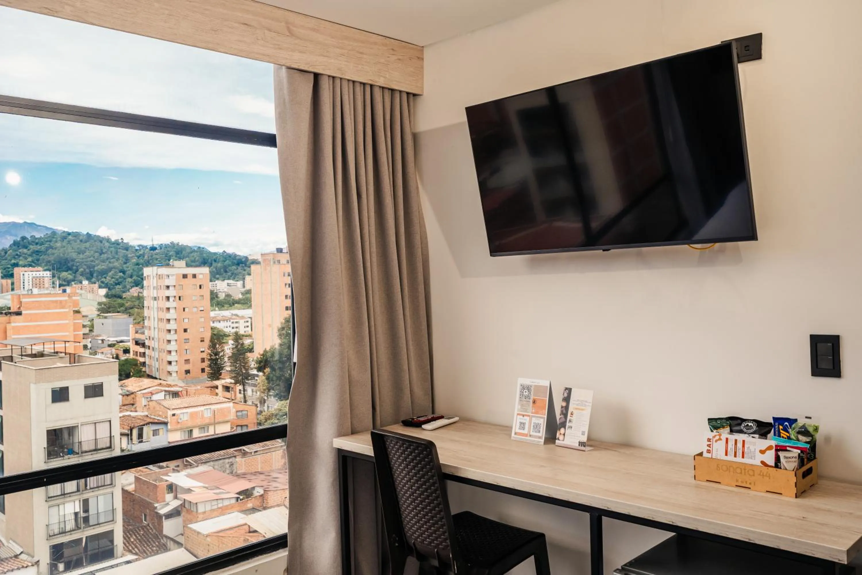 Bed in Sonata 44 Hotel Laureles