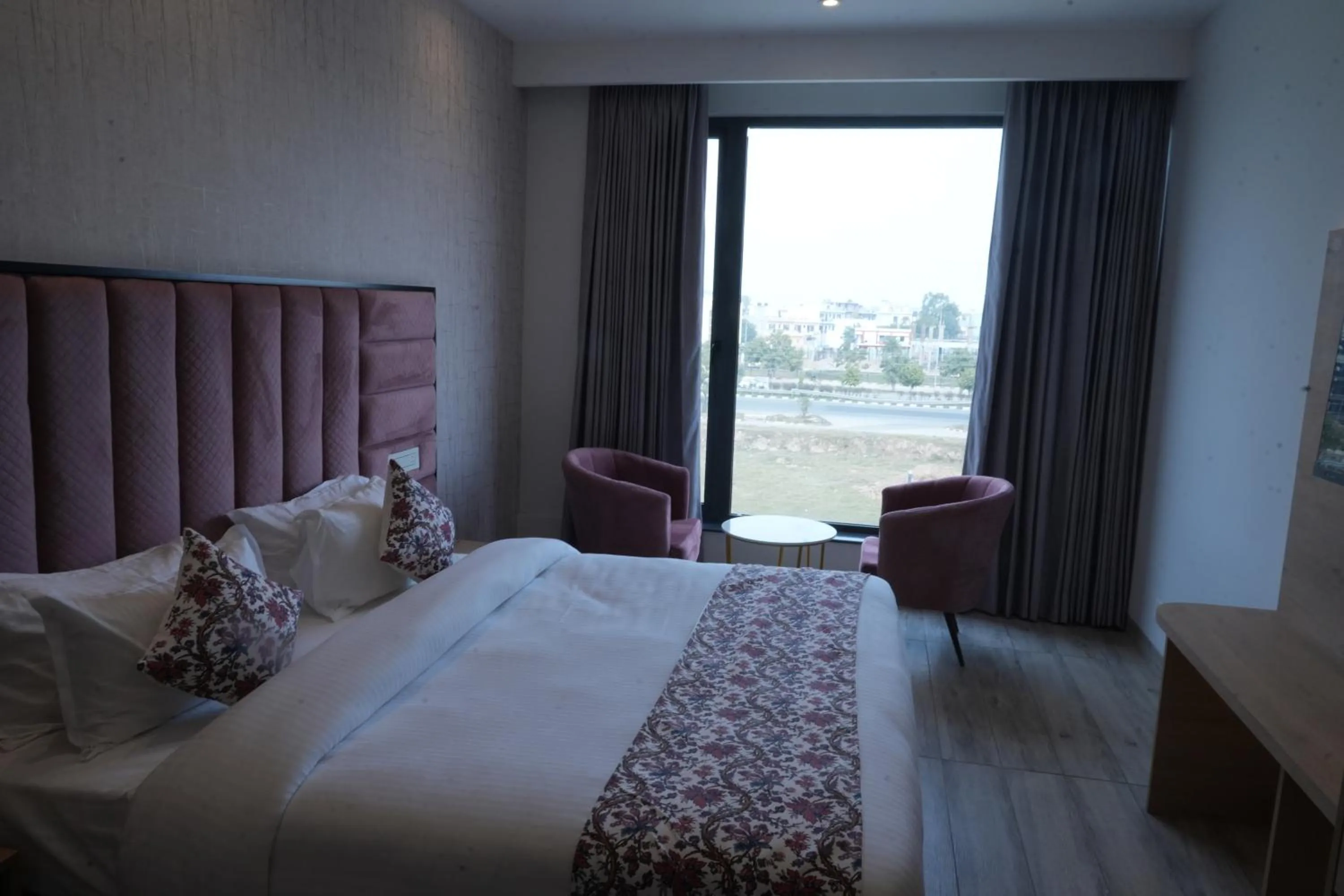 Bed in ACR Luxury Hotel