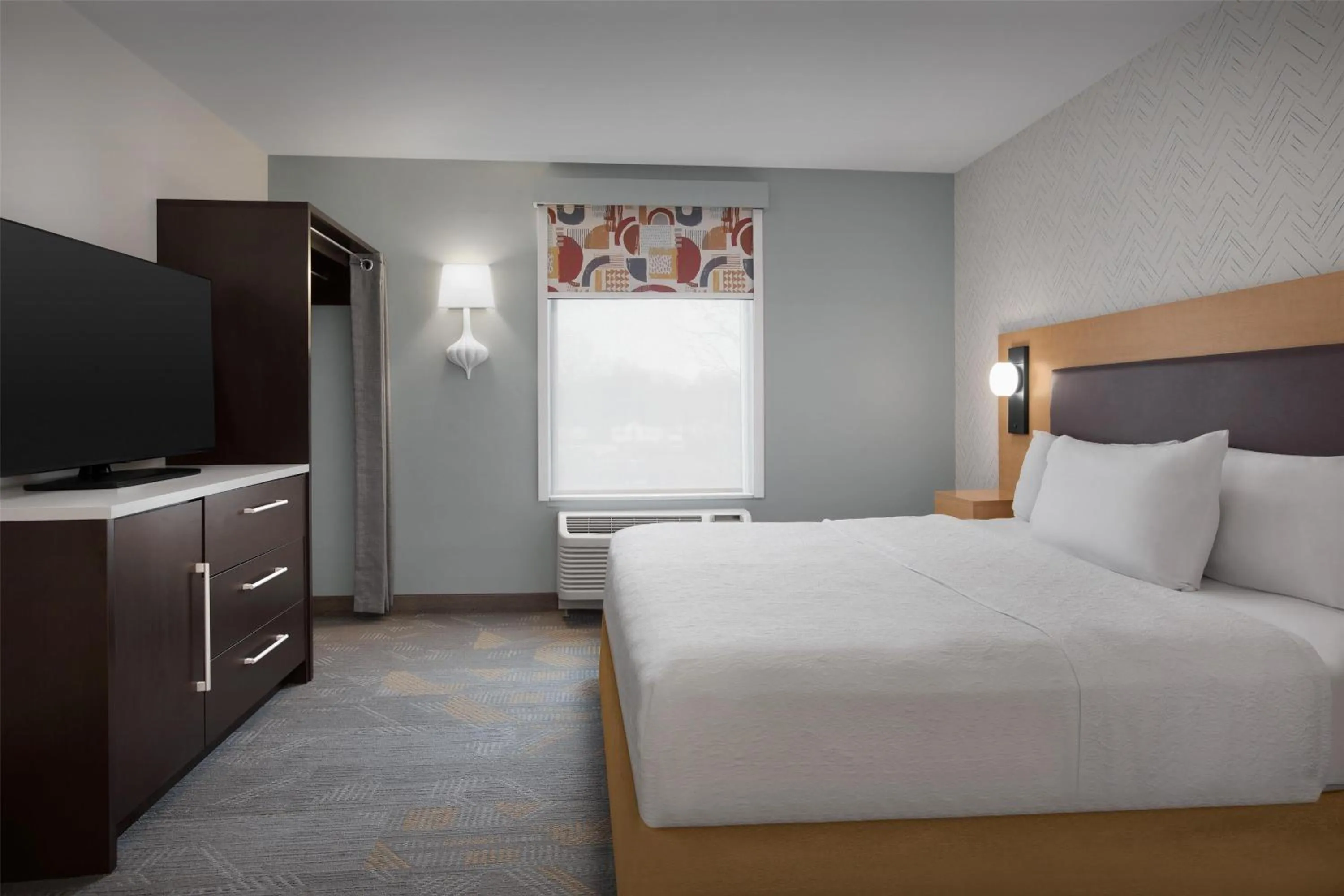 Bed in Home2 Suites by Hilton Sioux Falls Sanford Medical Center