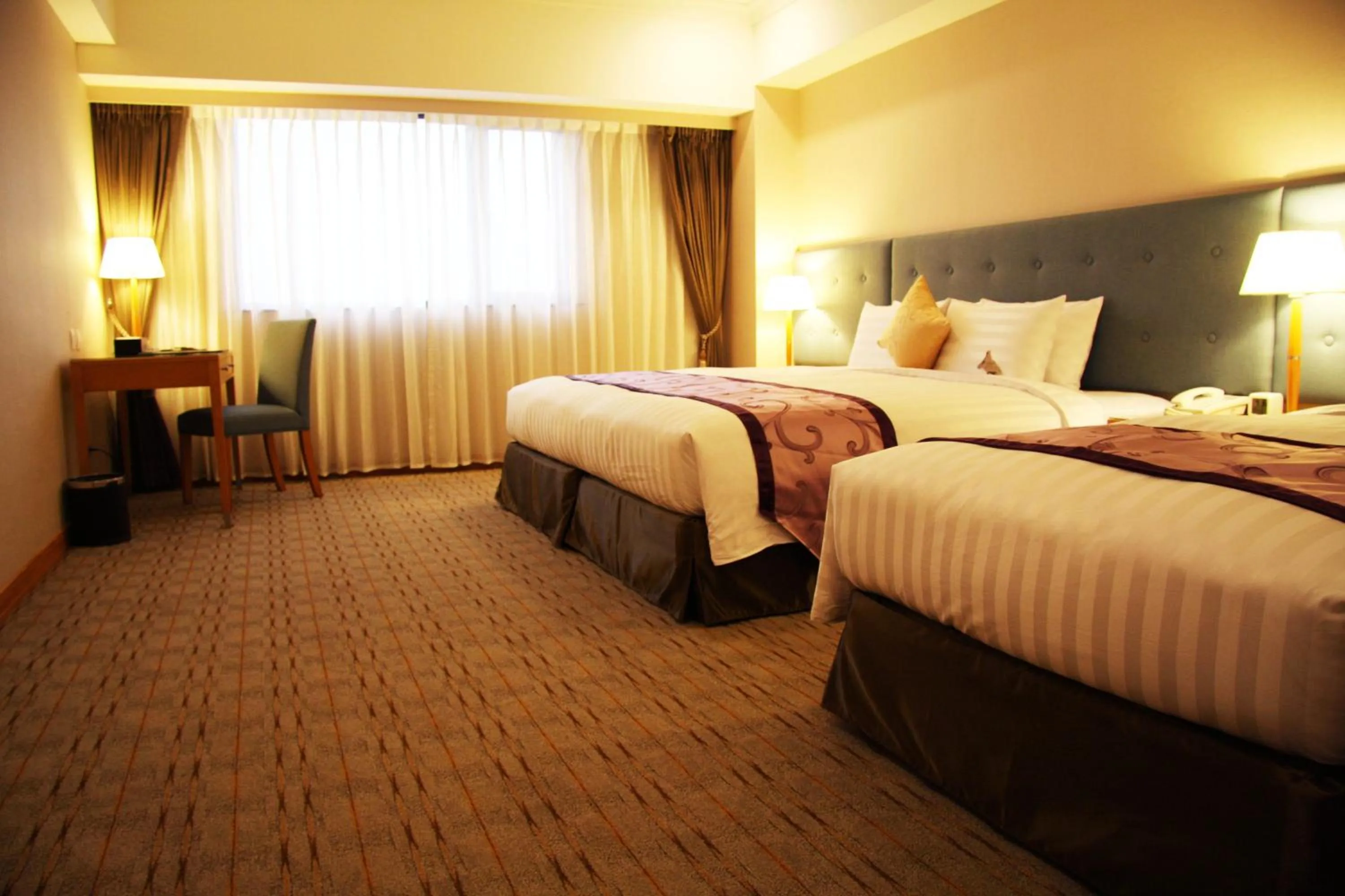 Bed in Fushin Hotel - Tainan