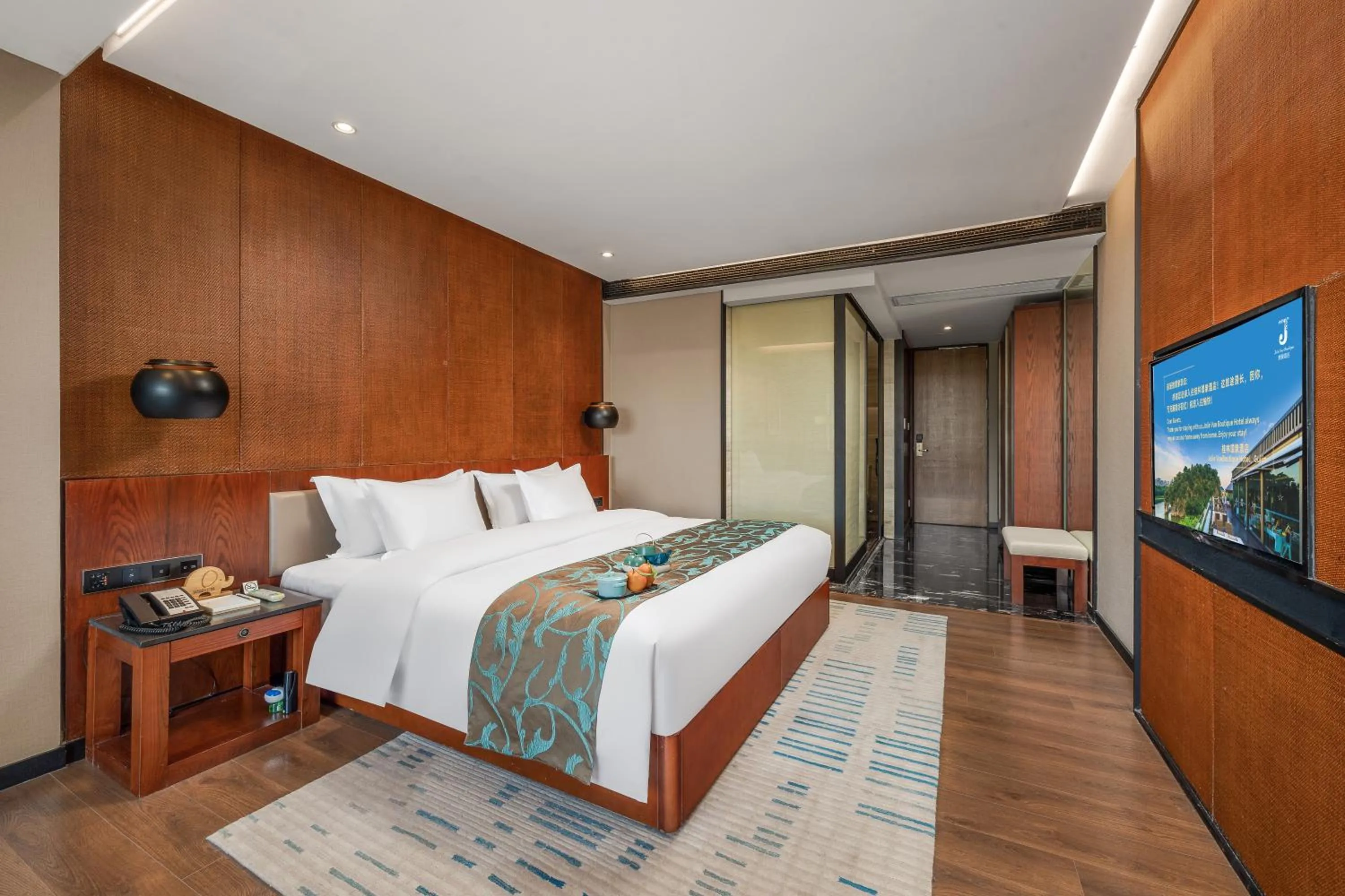 Bed in Jolie Vue Boutique Hotel Guilin (near Elephant Trunk Hill)