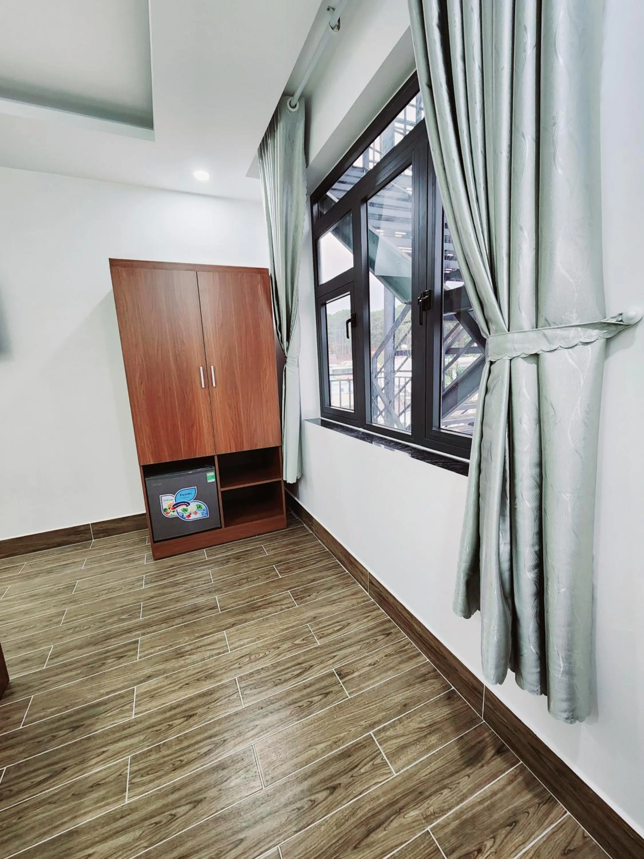 wardrobe in Happy Bun Hotel Da Lat