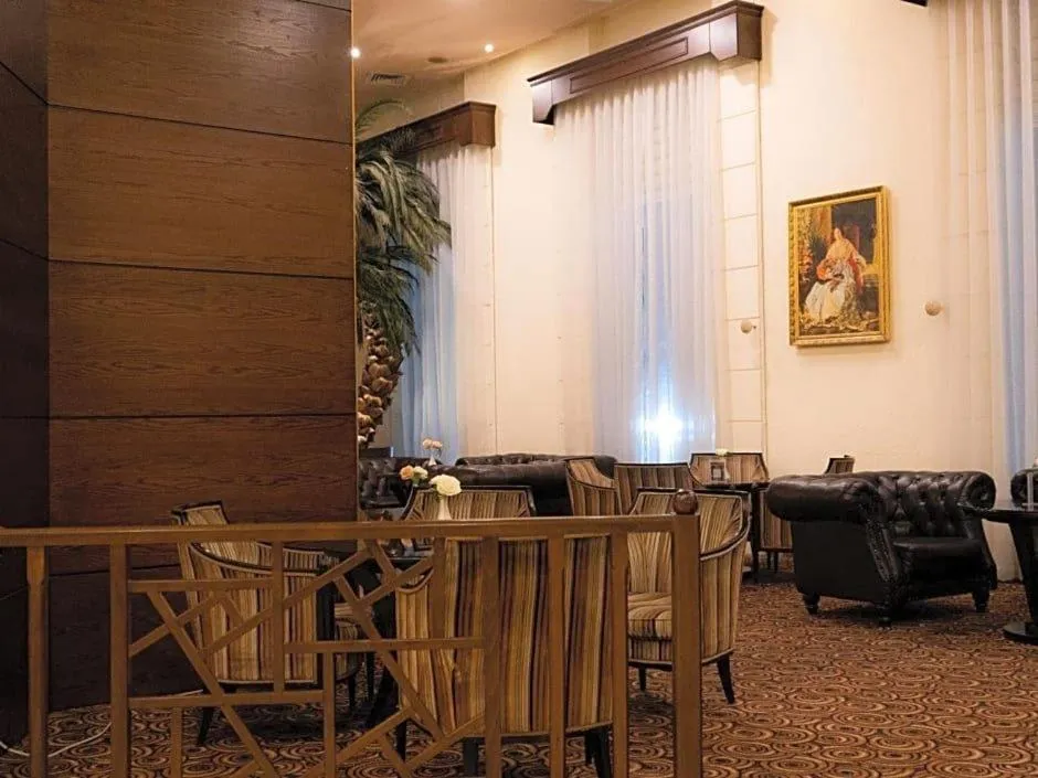 Seating area in Arena By Trend