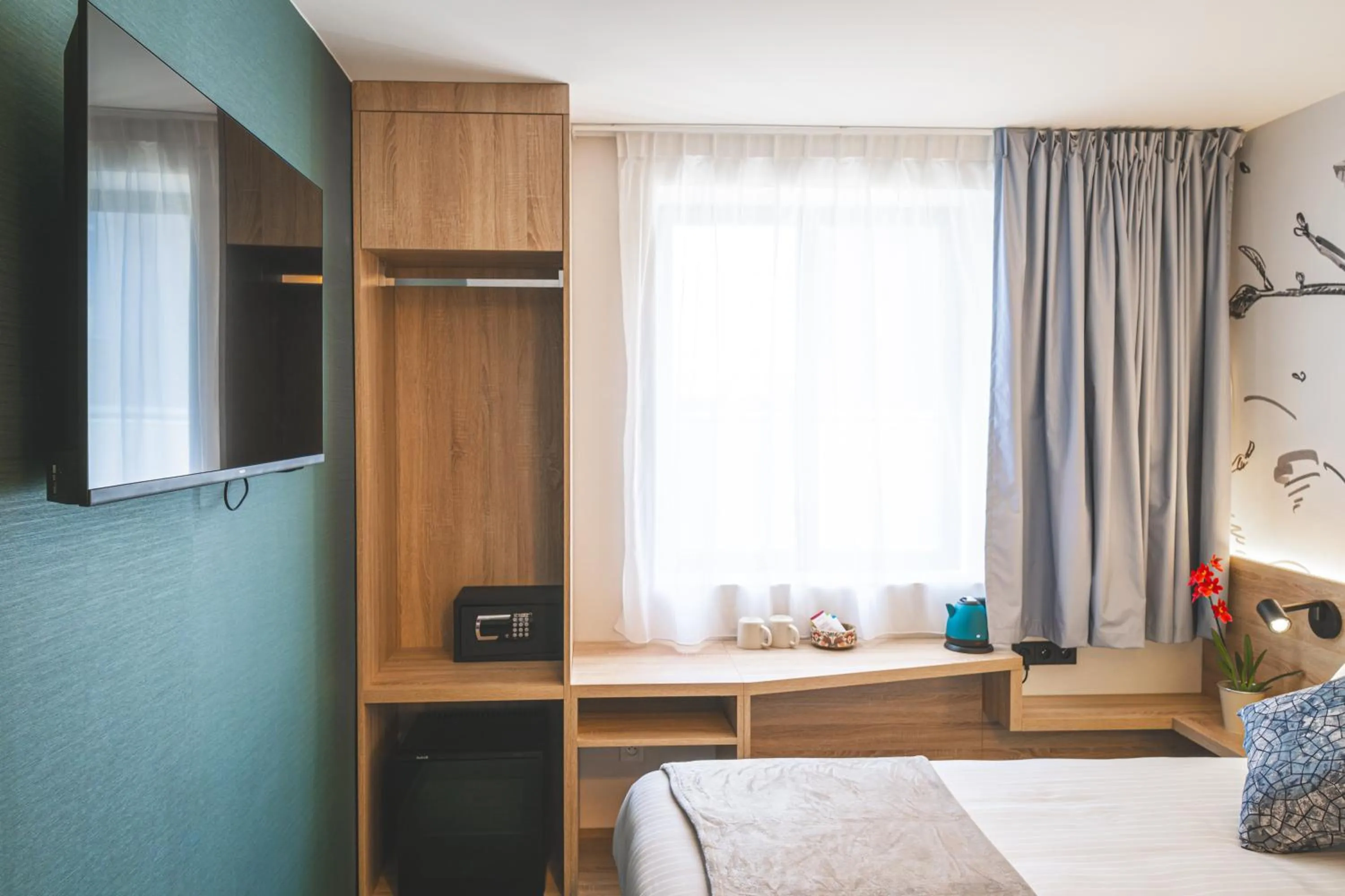 Bed in GREEN PARK HOTEL PARIS