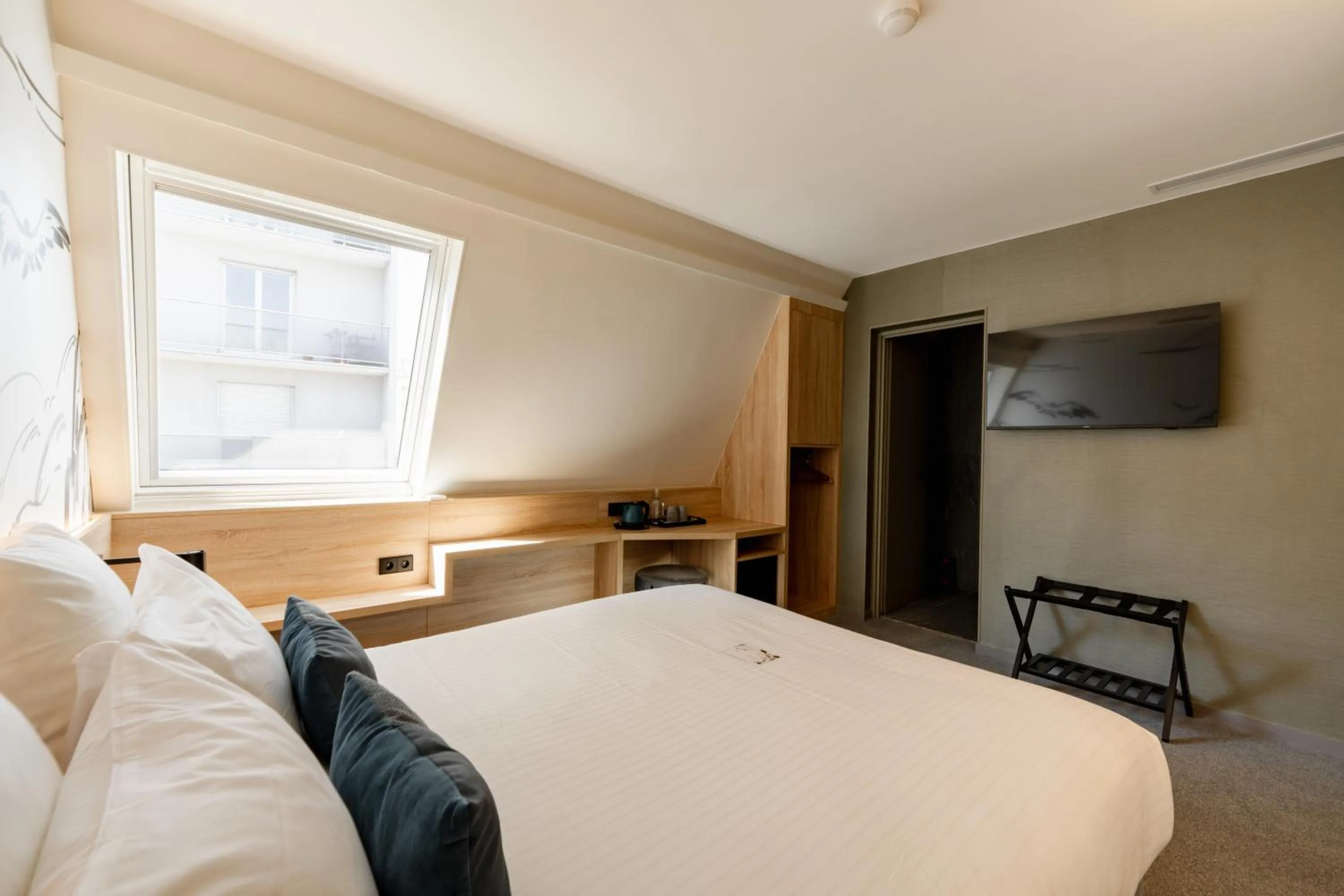 Bed in GREEN PARK HOTEL PARIS