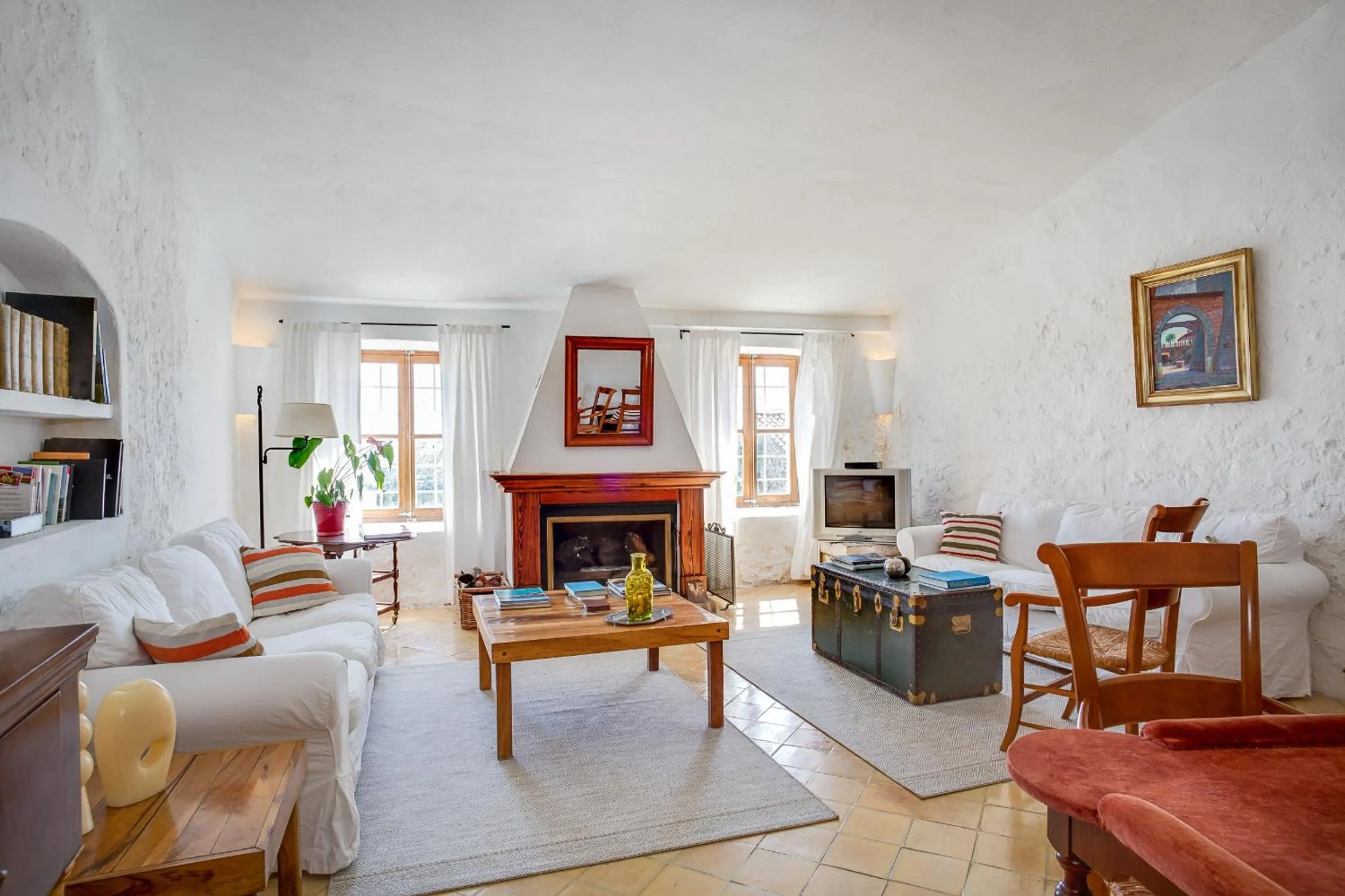 Communal lounge/ TV room, Bed in Finca Es Castell
