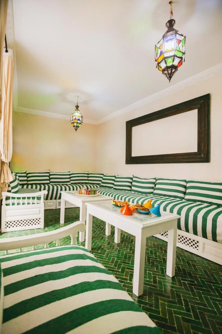 Communal lounge/ TV room in Riad Zazz
