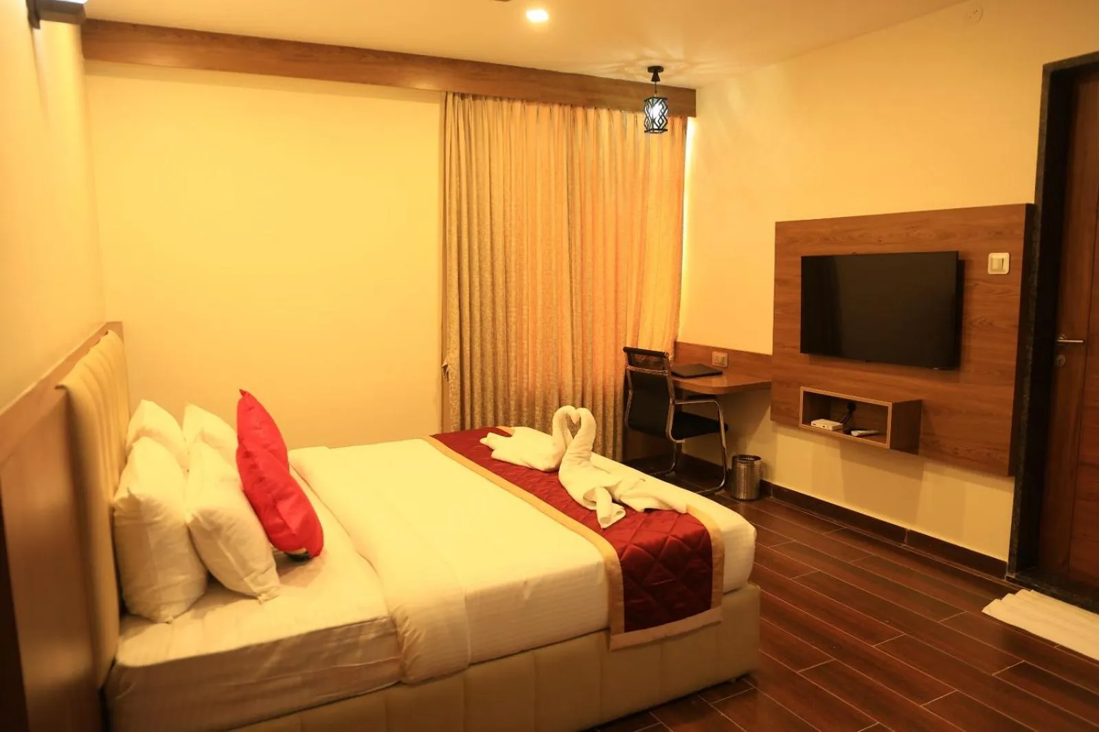 Bed in Hotel Anand Grand