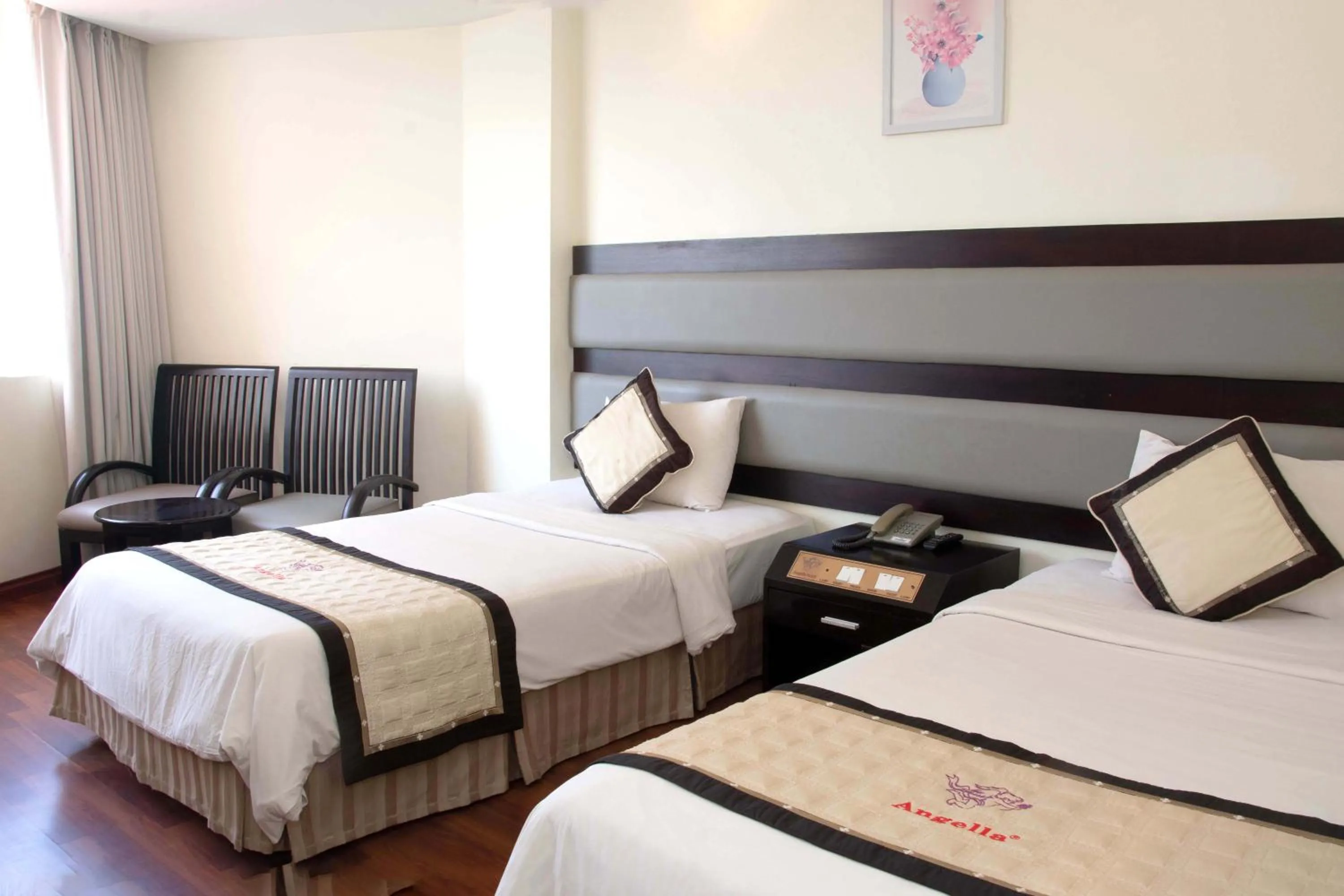 Bed in Angella Hotel