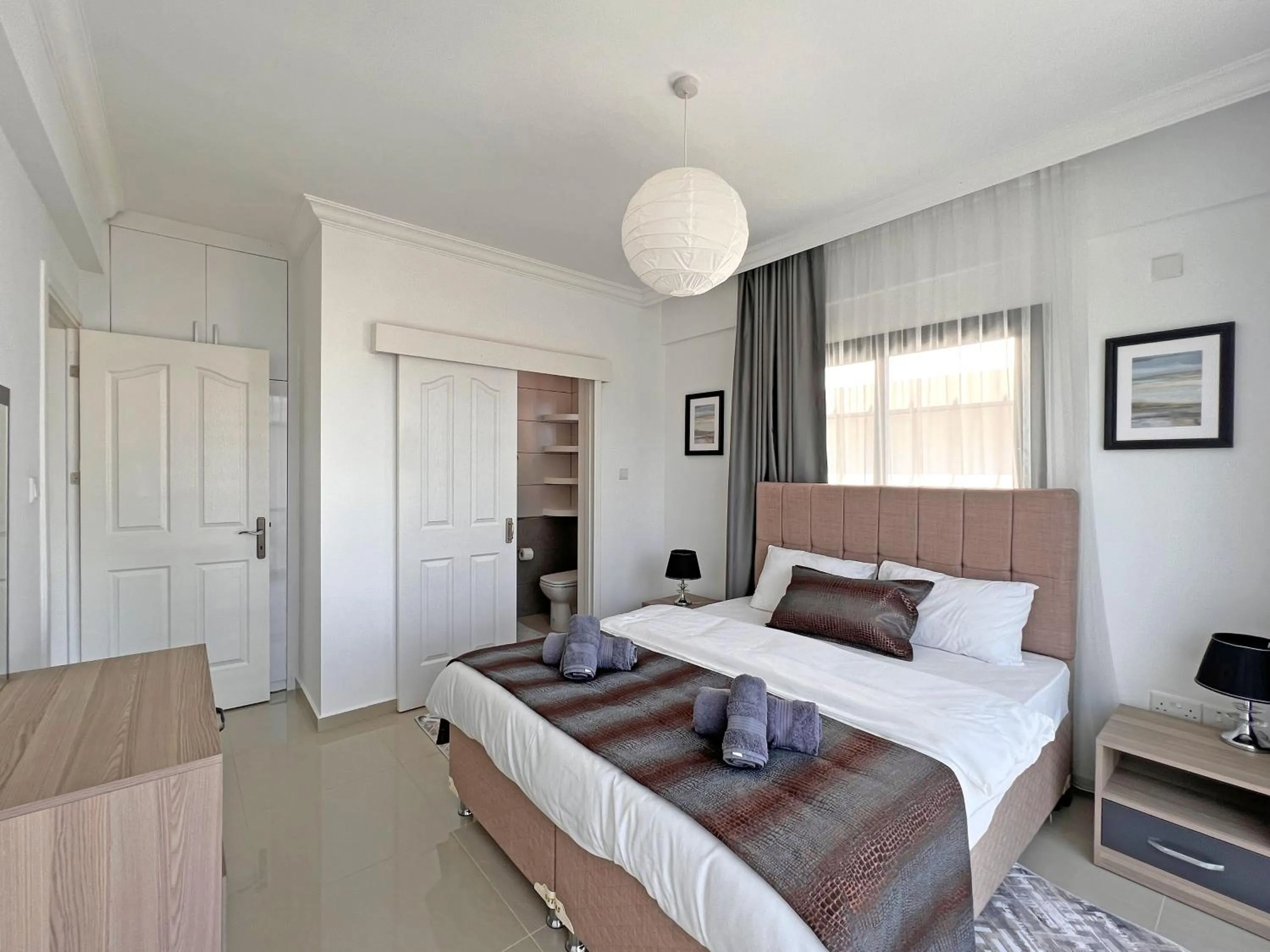 Bed in Skyline Paradise Villas