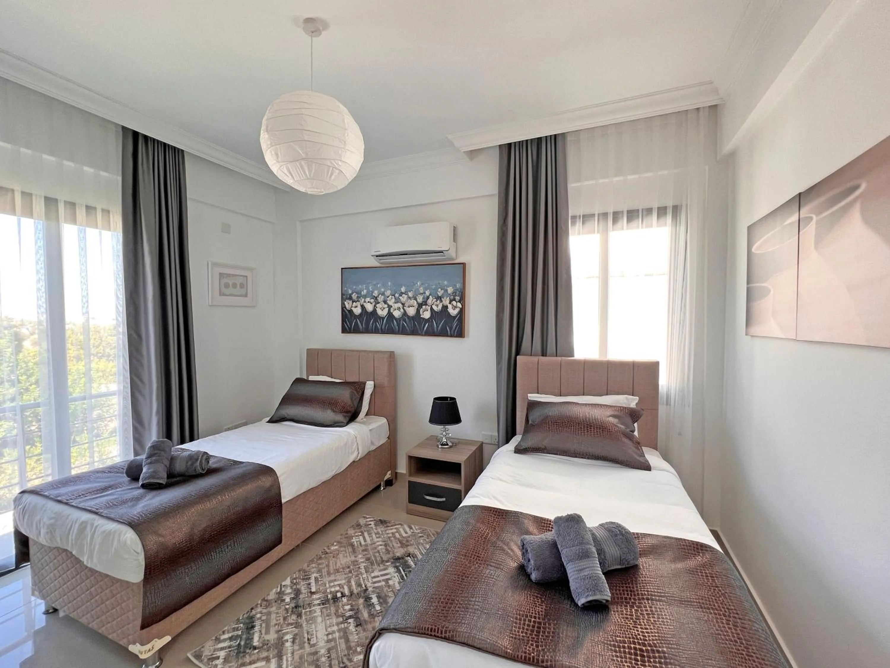 Bed in Skyline Paradise Villas