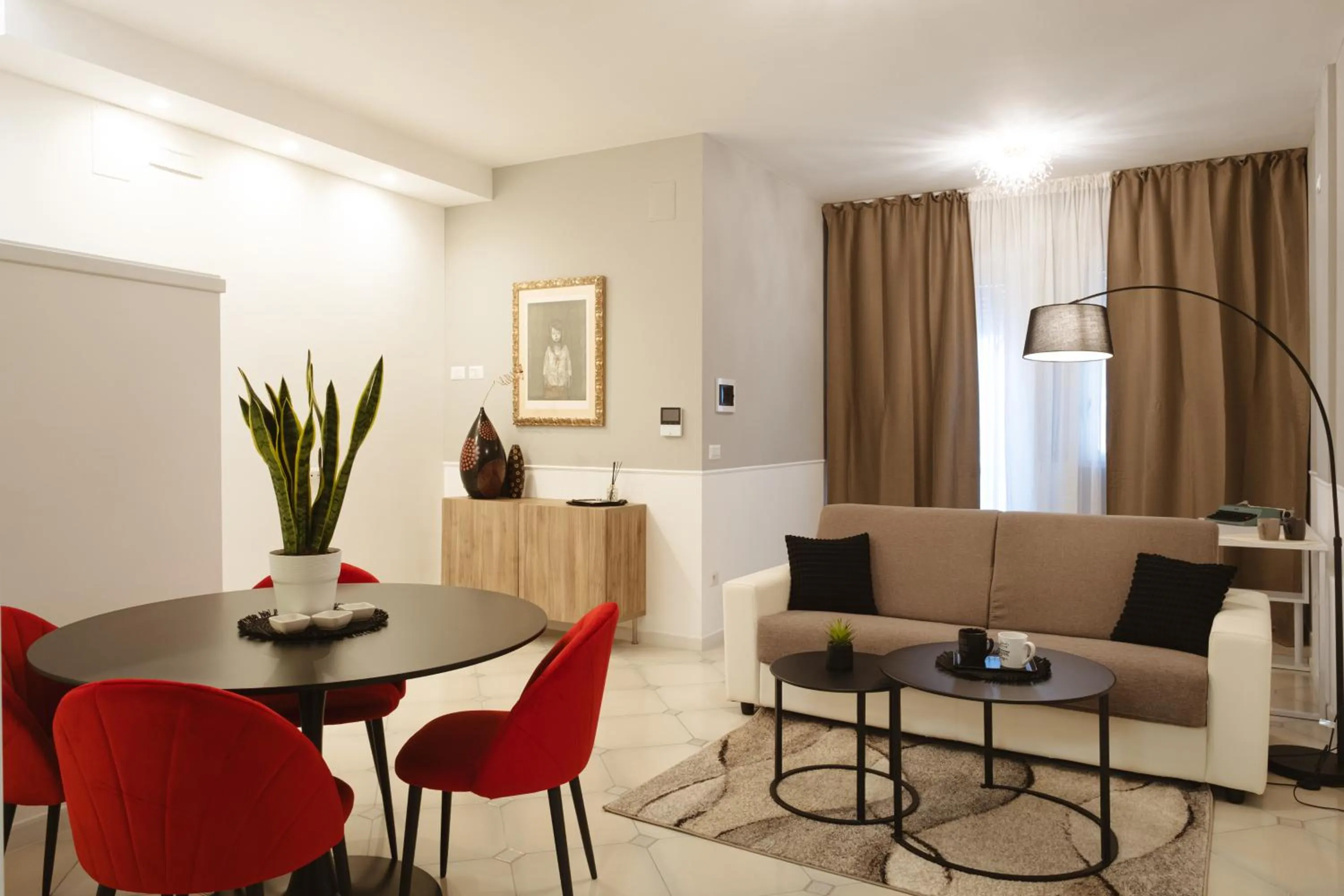 Communal lounge/ TV room in ALBERGO DIFFUSO Dimora Rossi Charme B&B