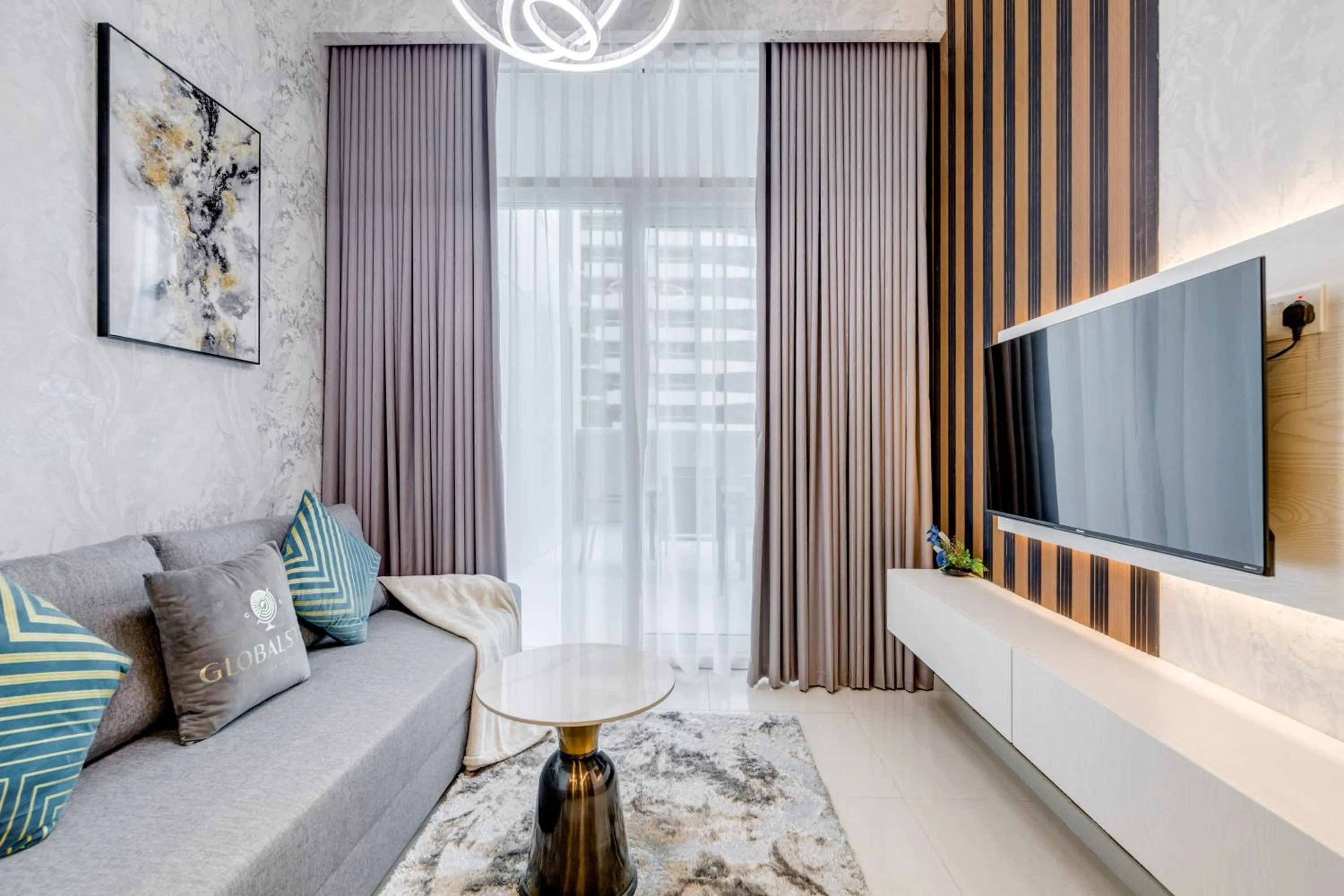 TV and multimedia in GLOBALSTAY. Luxury Apartments Near The Dubai Canal