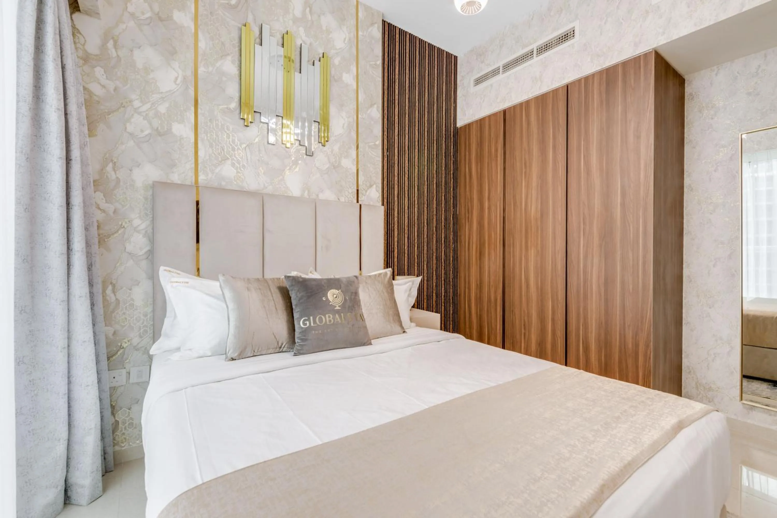 Bed in GLOBALSTAY. Luxury Apartments Near The Dubai Canal